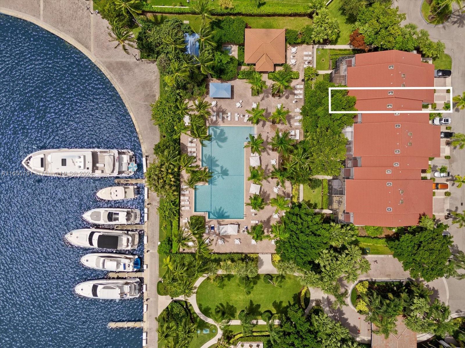 Rare opportunity-motivated Seller! This beautifully updated 2,373 Sq. Ft. townhome with 3 bedrooms and 2 baths in Aventura offers serene views of the pool and Waterways Marina. The home offers 20" marble floors, high ceilings, and a kitchen featuring granite countertops and wood cabinetry. Highlights include a large screened patio, a new A/C, hurricane shutters, and a one-car garage with built-in storage, plus a driveway and carport for guest parking. The community provides a pool, Jacuzzi, and tennis courts, and welcomes two small dogs. With the marina just steps away and conveniently close to restaurants and shops. A unique opportunity in an excellent location.