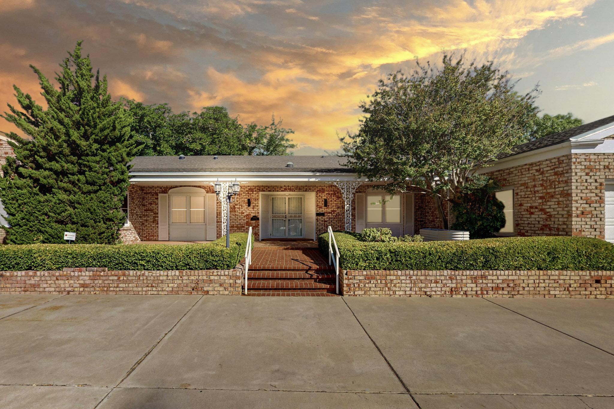 This exquisite custom home sits on a beautiful .45-acre lot in the Altura Park neighborhood. A formal dining room is located off the entryway & easily flows into the butler's pantry, which makes entertaining a delight. The kitchen-dining area is a culinary haven, featuring expansive granite countertops, a 6-burner Wolf gas stove with a double oven, a warming drawer, 2 refrigerators, and a butcher block island with sink. Two spacious living areas, each with a fireplace; both lead out to the long veranda porch. To the left of the foyer a private and comfortable bedroom and bathroom are perfect for an in-law suite, guests or can be used as an office. The primary bedroom has a fireplace, and the large en-suite bathroom has two walk-in closets, dual vanities with granite countertops and