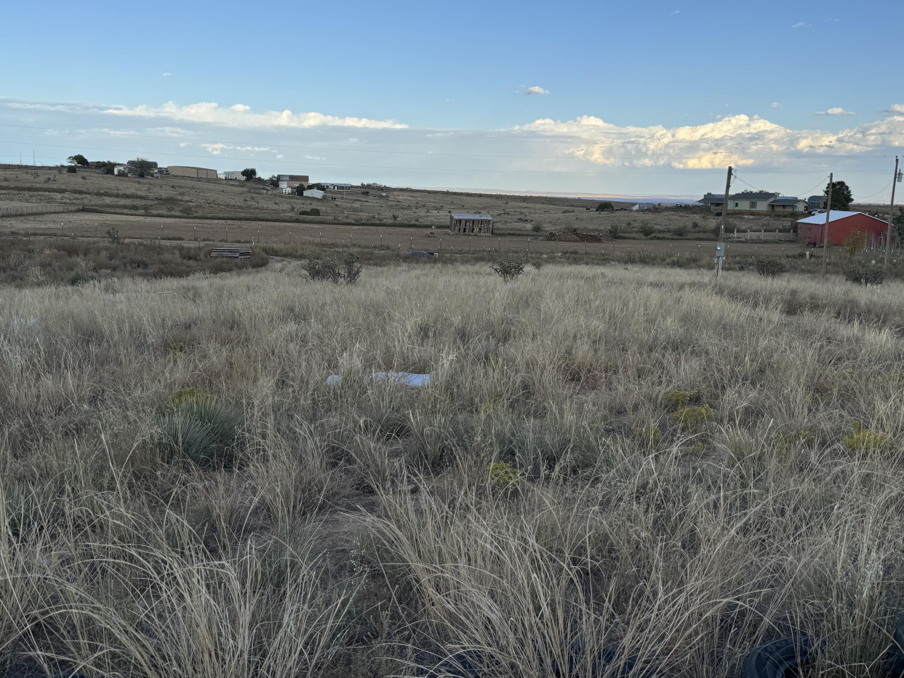 Save thousands on this 5-acre lot with fully functional utilities located in the center of the property, avoiding the need for connections at the property line. The single-wide home is uninhabitable and should be removed. The home is connected to a private well, with a shared well available at the property line. Enjoy 360-degree views, with breathtaking sunrises and sunsets, making this land ideal for development.