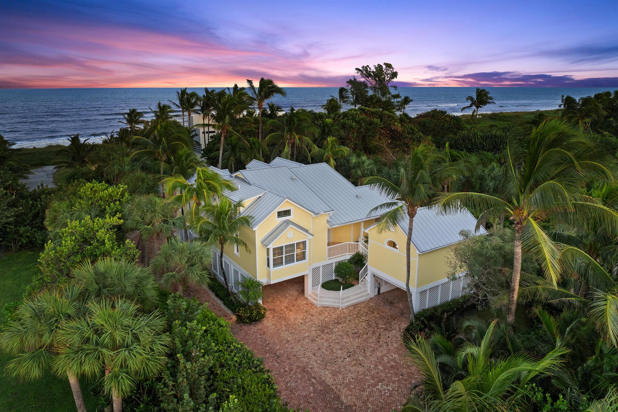 Oceanview, walk to the beach, and a short drive to Apogee, Medalist and McArthur Golf Clubs, Discover the epitome of refined coastal living on Jupiter Island with this stunning 5-bedroom, 5-bathroom solidly built beach cottage spanning 3,305 square feet. A true masterpiece of craftsmanship, this home is designed with meticulous attention to detail, blending timeless charm with modern luxury.Step into the inviting great room, where a soaring vaulted ceiling, pecky cypress accents, and rich wood floors create an atmosphere of warmth and sophistication. Sunlight floods the space through Hurricane-Rated Windows and elegant French Doors, seamlessly blending indoor and outdoor living. Nestled in one of Florida's most exclusive enclaves, this residence offers the perfect balance of privacy and impact windows and doors that bring the beauty of the outdoors inside.

Built to last, this home features concrete block construction, Hardie Plank siding, impact glass windows and doors, and a charming Chicago-brick paver driveway and patio. A separate, detached 5th bedroom provides additional privacy and versatility for guests. 

The property is equipped with five AC units, with four replaced in 2024 and one in 2023, ensuring consistent comfort throughout the year. Additionally, the 2013 aluminum standing seam metal roof offers both durability and style, designed to withstand the coastal elements while adding a sophisticated touch to this already stunning property. 

Offered fully furnished, this home is completely turnkey, just move in and begin enjoying the exceptional lifestyle that Jupiter Island offers. 

Located in one of Florida's most exclusive zip codes, this residence combines unparalleled privacy with proximity to world-class amenities, including top-rated schools, premier dining, luxury shopping, and easy access to Palm Beach International Airport. 

This exceptional home is ready to welcome you, schedule your private showing today to experience this rare opportunity for coastal elegance and sophistication.

Luxury, discretion, and serenity, this is Jupiter Island.