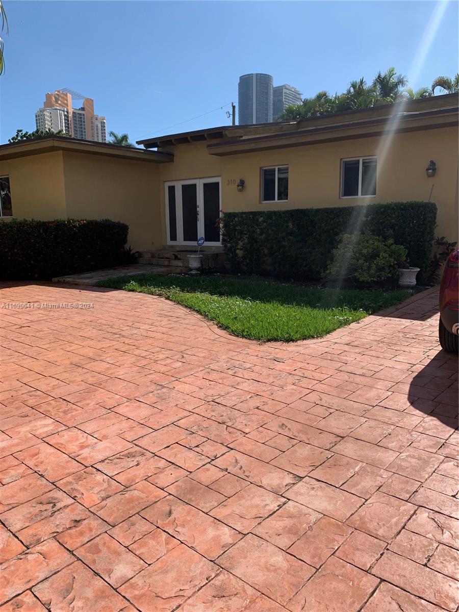 A TOTALLY REMODELED SINGLE HOUSE IN A GREAT NEIGHBORHOOD, SUNNY ISLES . AMAZING LOCATION !!!
4 bedrooms, 3 full bathrooms, a large Den with French doors to the backyard . A Jacuzzi  and a 200 SF Shed . A patio for entertainment. 2 Refrigerators inside the house and a third one in the shed . 2 bedrooms and a bathroom have a separate entrance . Use for family or rent out . Upgraded  Electrical panel , impact windows , skylights and doors . Porcelain and marble bathrooms . Driveway can accommodate up to 10 cars . Near A+ Schools . Walking distance to the beach , supermarkets and the house of gods .