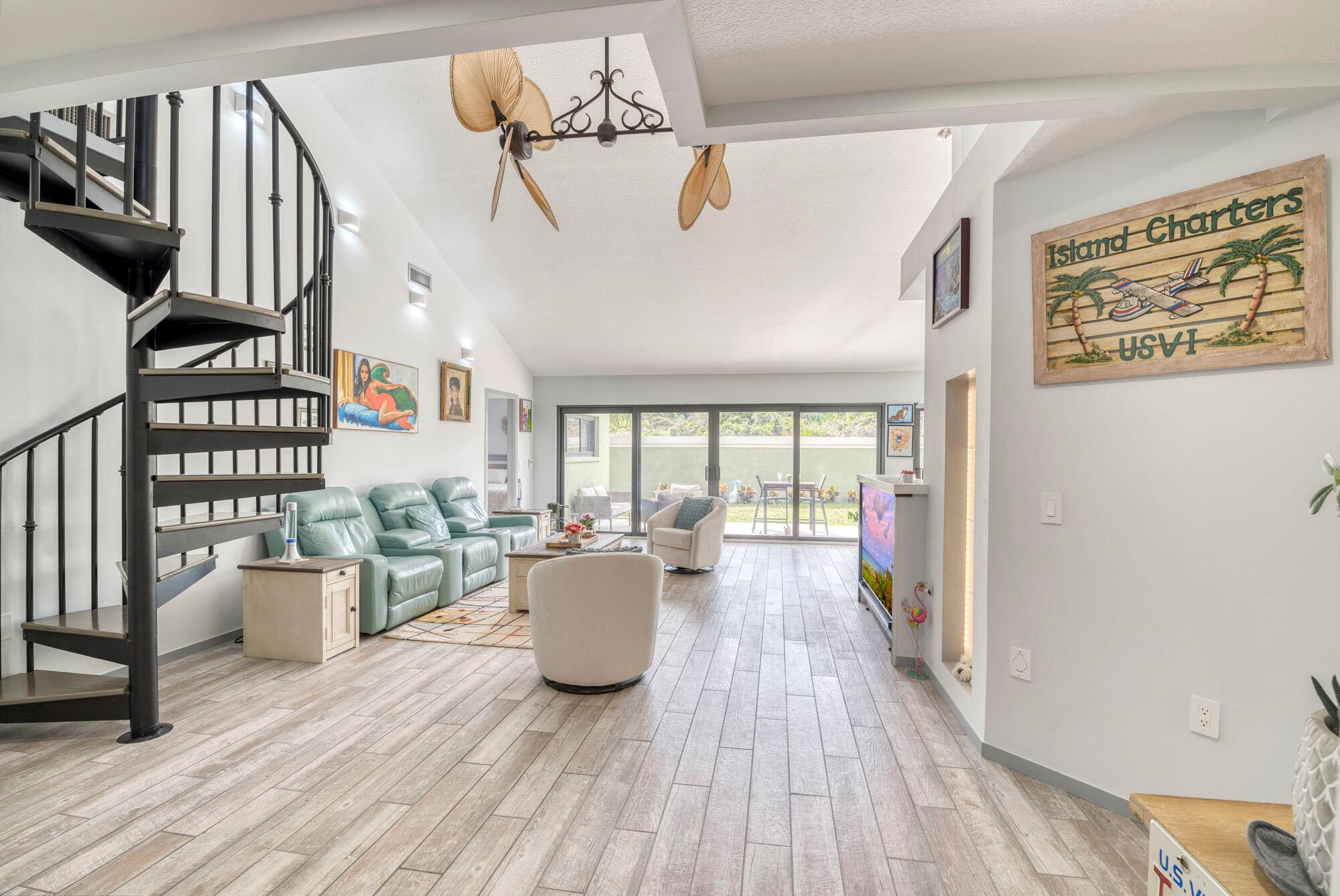 This exquisitely fully renovated Ridge at the Bluffs home has it ALL. The closest proximity to the beach for the Ridge community and an expansive view of the Ridge Preserve to the west is stunning (nothing is behind the home). Backyard big enough for a pool. Community activities include Pickleball, Tennis, Basketball, with community, pool and Jacuzzi.The open concept floor plan is bright and spacious with coastal design aesthetics fit for Jupiter. The open kitchen has been expanded for extra chef space and has a unique 8 person dining bar. The main living space is flooded with natural light from floor to ceiling sliders and is open to a comfy den/office with pocket doors for privacy. Iron spiral stairs takes you up to the open, finished loft, currently being used as a pilates room.
