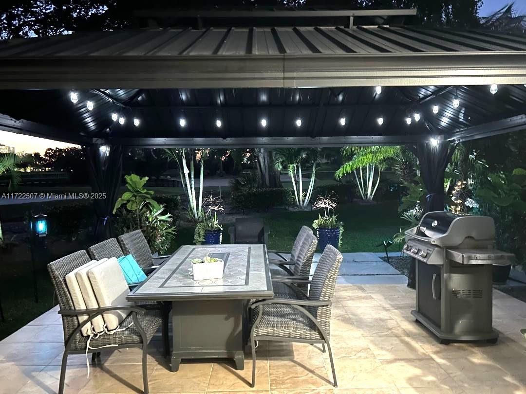 This stunning property offers breathtaking views of the lake & Turnberry golf course. It includes a spacious patio overlooking the lush tropical golf course, providing a serene natural ambiance. Features an open kitchen with stainless steel appliances, a well-lit dining room with a 20-foot-high ceiling, 2 skylights, a beautiful glass staircase, high ceilings, and 2 terraces. The primary bedroom offers floor-to-ceiling windows with a view of the golf course, & the master bath features a Jacuzzi, marble floors, The property comes with electric hurricane shutters & access to community amenities such as 2 tennis courts, a play area, a heated pool, a clubhouse, & gym. Internet and cable services are also included and conveniently located near the Brightline station. conventional loans are ok.