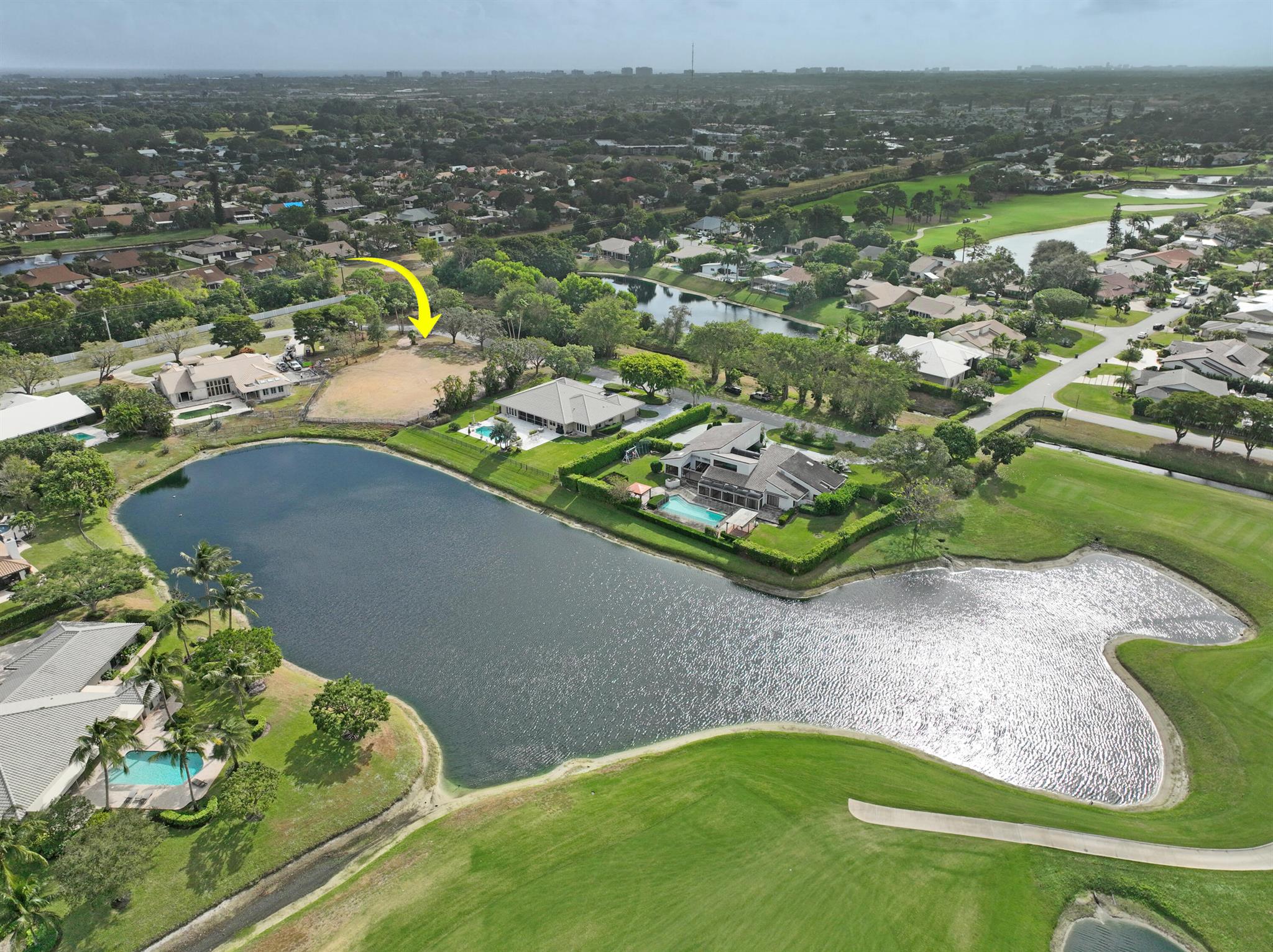 Price reduction! Discover an extraordinary opportunity to create your dream home on a spacious .97 acre lakefront lot in the prestigious SeagateCountry Club at the Hamlet. This remarkable property, located at 330 Glenwood Drive, offers a serene and tree-lined setting withpicturesque views of a pristine lake and the beautifully manicured golf course.Seagate Country Club provides the ultimate South Florida lifestyle, with optional memberships granting access to an unparalleled rangeof amenities. Enjoy a newly renovated golf course, private beach club, water sports, pickleball and tennis courts, state-of-the-art fitnesscenter and spa, exceptional dining options and more. Whether you seek relaxation or adventure, this community offers a refined,luxury lifestyle tailored to your... in a private and tranquil neighborhood, this property is just minutes from the vibrant heart of downtown Delray Beach. Indulge in a wide array of restaurants, boutique shopping, cultural events, sports activities, and the wonderful sun-kissed beaches. This spacious parcel is ready to be transformed into your custom masterpiece. Included with the property are fully completed plans for a stunning 7,100 square-foot home with an additional 1,100 square-foot guest house. These designs have been meticulously crafted to maximize the potential of this prime lot, ensuring the home harmonizes with. its exceptional surroundings. Situated on a peaceful, tree-lined street with Seagate's premier ready-to-build home site, 330 Glenwood Drive offers panoramic water views and unparalleled access to world-class amenities. The only ready to build site in Seagate CC! This is more than a property - it's a lifestyle. Don't miss this rare opportunity to bring your vision to life in one of Delray Beach's most coveted communities.