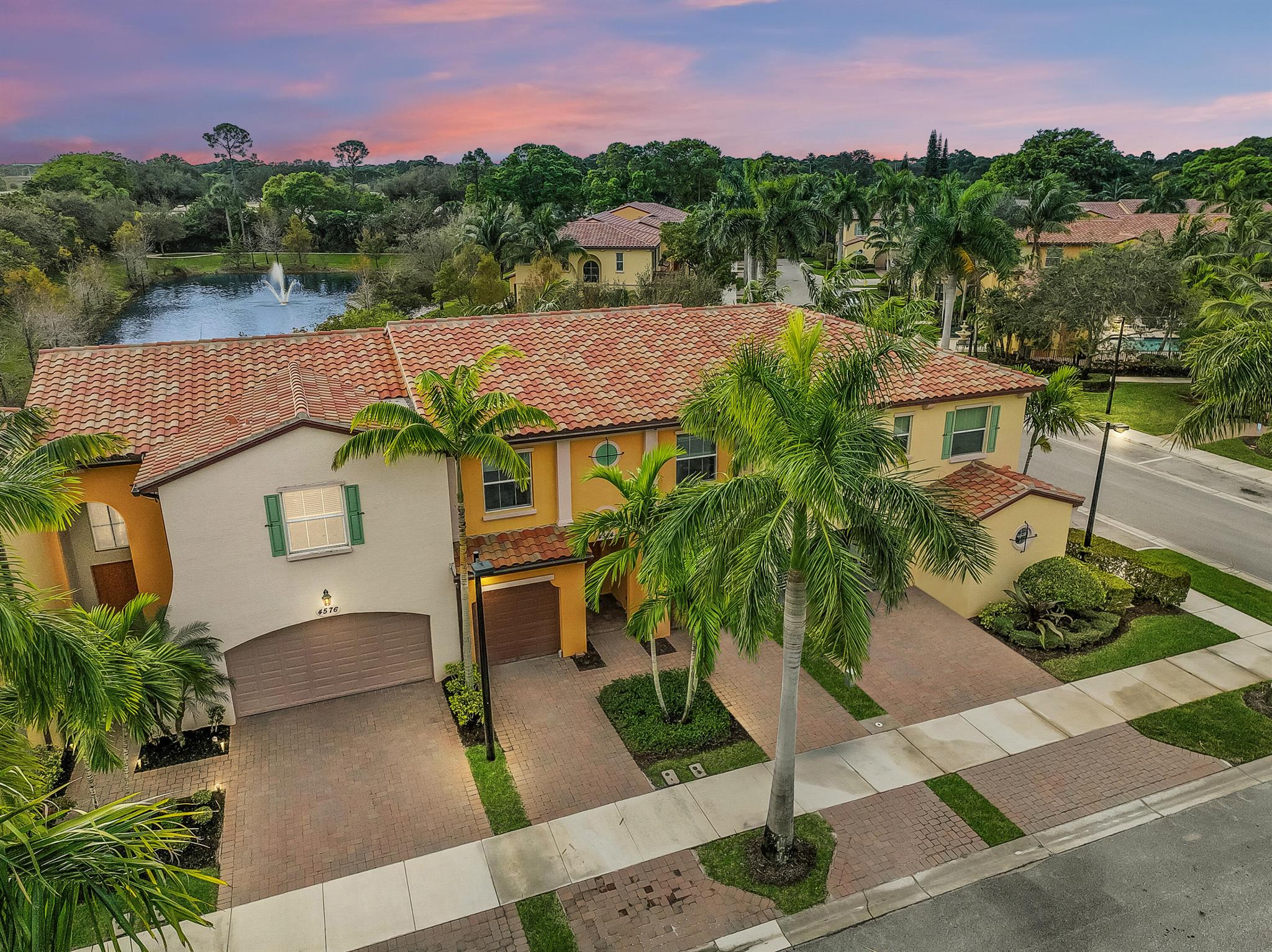 New AC, LAKEFRONT! 2014 built, 3 bed, 2.5 bath townhome with IMPACT GLASS & 2 car garage in the gated community, Trevi. Lake views welcome you home to a bright, south facing great room concept. The kitchen equipped w/ NEW Stainless steel appliances, granite counters, a 3 seat island with storage, timeless backsplash all overlooking the great room's dining and living space which is served by a half bath. Your covered patio sits lakeside w/ a path to Trevi's resort style pool. Upstairs, 2 guest bedrooms are served by a full bath w/ tub shower combo while the main bedroom boasts the best lake views in the home, a walk-in closet, sitting room and a luxurious bath w/ soaking tub, glass shower & dual vanities all served by a separate laundry room. Cable & Int. included, A-Rated Schools, Gym **BRAND NEW AC, Carpeting (stairs &amp; second floor) Fence, Appliances &amp; Plumbing Fixtures** Presenting a 2014 built, LAKEFRONT, 3 bedroom, 2.5 bath immaculate townhome with IMPACT GLASS AND DOORS and a two car garage in the private, gated community, Trevi at the Gardens. Inside, this "Dante" floor plan is equal parts, smart and stunning, enhanced further by the home's Southern exposure allowing natural light to fill every corner. Beyond the foyer, you will find the great room with large format tile on-the-diagonal at your feet and enchanting lake and fountain views ahead. The great room concept allows remarkable flexibility between the dining area and living areas capable of hosting a romantic dinner for two, or one of life's grand celebrations with family and friends. The kitchen overlooks it all ensuring you never miss a moment and is equipped with, an island with storage, seating for three, granite countertops, modern white cabinets topped with crown moulding, a BRAND NEW (2023) stainless steel appliance suite, a backsplash that ties it all together and finally a window above the sink that looks onto your covered &amp; FENCED (2023) patio offering sparkling lake views and spectacular sunsets. The first floor is finished with a powder bath with pedestal sink, and a TWO CAR GARAGE far more functional than some floor plans that offer two single stalls. As the sun sets, journey upstairs and discover two guest bedrooms one Southern facing, the other North facing while both offer plenty of room to stretch out and ample closet space. Next, a full bath in the hall boasts a tub/shower combination, single vanity and polished chrome fixtures. At the end of the hall, you will find a laundry room with storage cabinets and you will love the convenience of having them on the same floor as all the bedrooms. Finally, the Owners Suite, a true sanctuary towering over the lake and fountains, the perfect vantage point for Florida sunrises. A cool, designer color palette welcomes you and the space itself is impressive including a sitting room that provides even more possibilities from a coffee bar to a Peloton station with a view. At left, notice the walk-in closet you can't live without, then prepare to relax in the luxurious Master Bathroom equipped with a large glass shower with decorative tile, separate soaking tub, dual vanities and a linen closet. For your convenience this home is completed with a security system, impact glass &amp; doors, extra storage in the garage, under sink water filtration and Wall Mount TV Ready. There is no doubt you'll love this home and Trevi at the Gardens has residents raving, they enjoy Cable, Internet, a grande, resort style pool &amp; mini gym, lakes, fountains affording owners a grand casual lifestyle within a charming, gated enclave. The location of Trevi within Palm Beach Gardens, FL is convenient to world class dining, shopping, beaches and entertainment. For the commuter access to I95 and the Turnpike is nearby and for the jetsetter, Palm Beach International Airport is just 17 miles away. Trevi is served by A-Rated schools including Marsh Pointe Elementary. All that is left to do is schedule a private showing today!