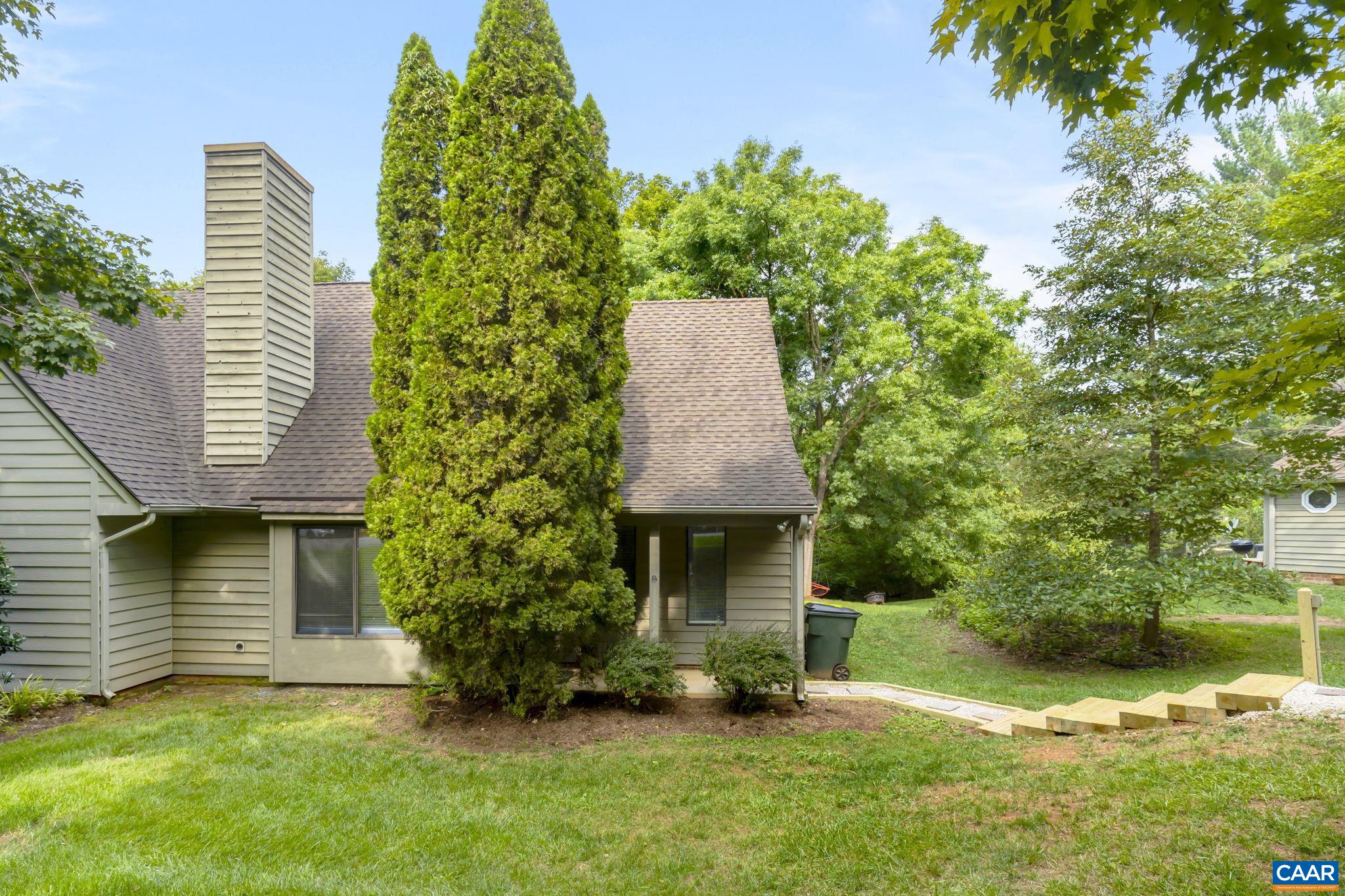 Welcome to your comfortable retreat in this quiet, walkable, Highlands neighborhood in Crozet, minutes away from Charlottesville and the Blue Ridge Mountains! This inviting two-bedroom plus loft home is perfect for those seeking ease and style! As you enter, you are greeted by a warm and welcoming living space with new flooring throughout the home. The open layout begins with the vaulted family room which opens to the kitchen and eat-in area. The main level primary bedroom has an attached bath and a large walk-in closet. The second floor features the additional bedroom and the lofted design off of the bedroom adds a unique charm and creates an open feel, while still maintaining privacy. The home backs to the woods and features a large backyard for entertaining and privacy. With easy access to local shops, parks, and hiking trails, this home truly embodies the perfect balance of convenience and tranquility. Ready to move in, this home offers the perfect blend of comfort, style, and location. Don’t miss the opportunity to make it your own!