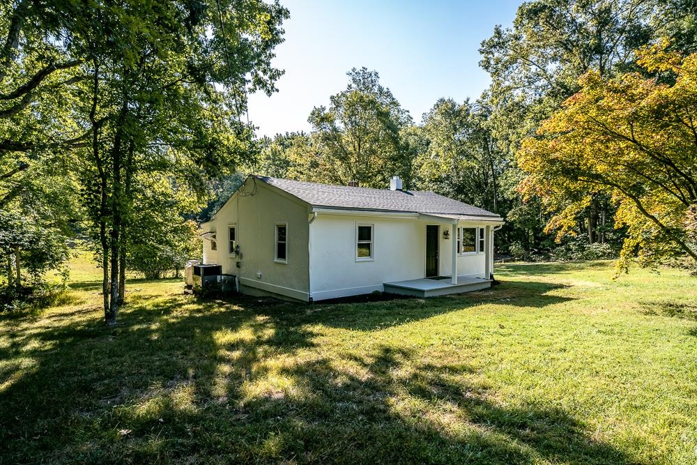 INVESTMENT OPPORTUNITY! CURRENTLY RENTED $1950/mo + $50/mo pet rent (1 dog). Accepted offer required to tour. Septic pumped and inspected last fall (2024). This fully renovated one-story charmer is located just minutes from the heart of Charlottesville and moments from Keswick Hall. Featuring 3 bedroom and 2 full bathrooms this home is the ideal size and layout for the modern family.  The new kitchen's granite countertops are the perfect compliment to the stainless steel appliances. Escape into the covered back porch for year-round outdoor relaxation. Luxury vinyl plank flooring throughout means no floor maintenance and easy-clean surfaces. Remodeled bathrooms. The list goes on! On a whopping 2 acres this close to Charlottesville - this kind of opportunity at this price and location does not come knocking often!! Contact your local Realtor to learn more. SOLD AS-IS, inspections for information only but current reports for both septic and home are shareable.