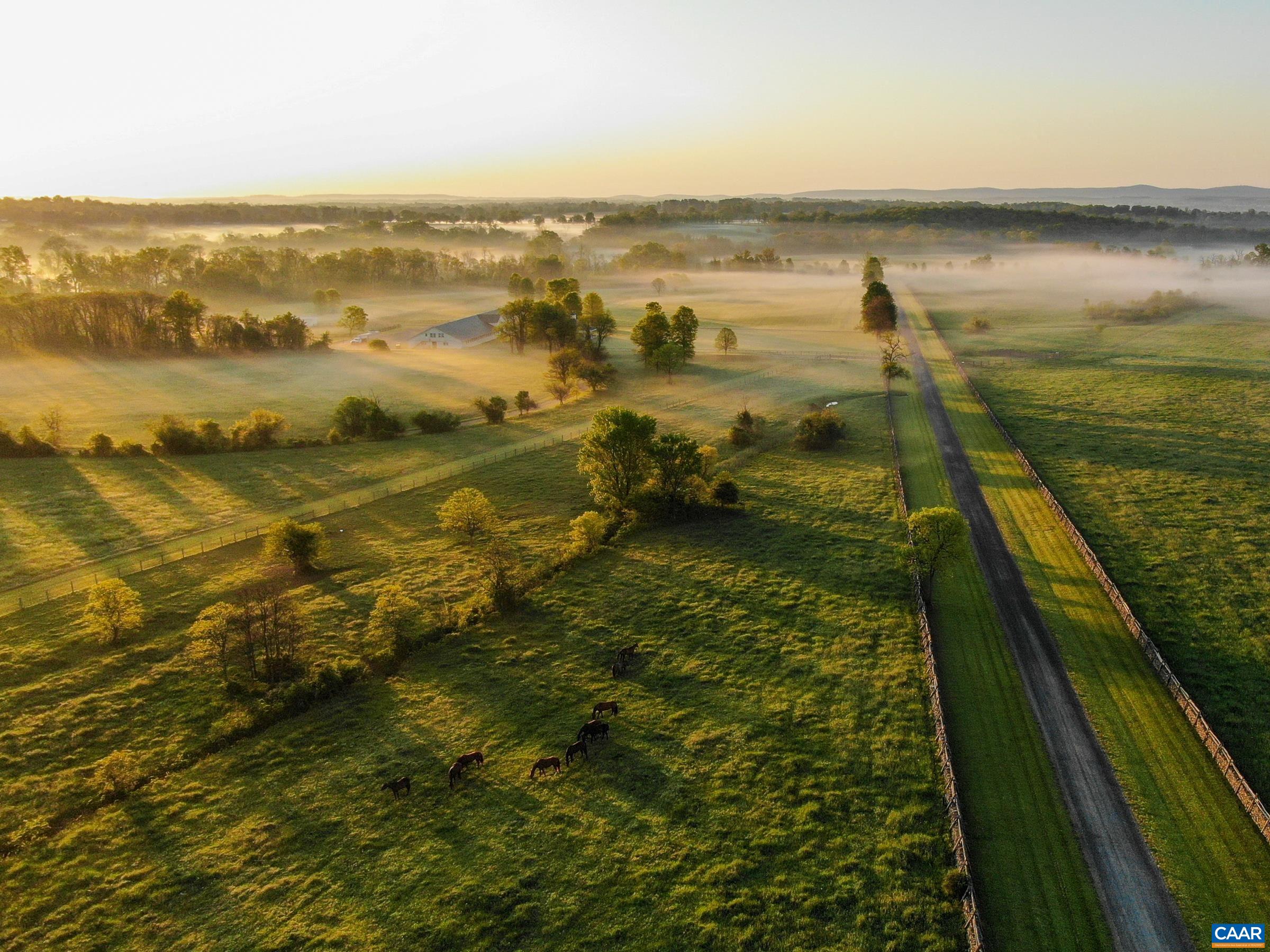 Landmark 1,100± acre estate in the heart of the Middleburg/Upperville hunt country. Steeped in history, Llangollen dates to 1795 and is anchored by a gorgeous 9-bedroom Colonial Revival house. Sited at the end of a mile long driveway, the house features sweeping 180-degree views over the property and surrounding landscape. Extensive improvements include 8 tenant cottages, numerous outbuildings, and 8 ponds, among others. Equestrian resources include a best-in-class polo facility, 7 barns, and expansive turnout options. 700± acres of mostly level open ground, and 400± acres of forested land. Phenomenal scenery and privacy, yet only 1 hr to Washington, D.C. and 15 minutes to Middleburg. Under conservation easement, contact broker for details. Llangollen is a true generational asset in one of Virginia’s most iconic landscapes.