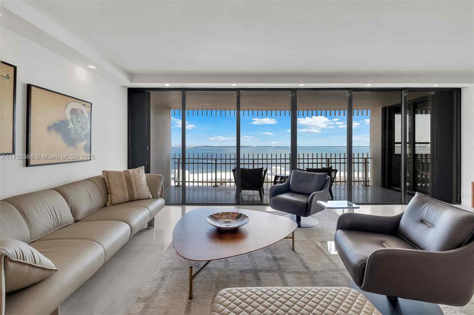 This stunning 2-bedroom, 2-bath unit offers everything you need: a beautifully renovated interior, spectacular views, and full furnishings. Spanning 1,882 sq. ft., this expansive unit on prestigious Grove Isle boasts sweeping vistas of the open bay, Key Biscayne, and the glittering downtown Miami skyline. The high-end renovation features porcelain floors, an open kitchen, elegant finishes, and large closets. 
 All assessments have been paid, and the property is easy to show. Grove Isle is a guard-gated private island just minutes from Brickell, Downtown, top schools, Bayfront parks, restaurants, and Miami International Airport.
