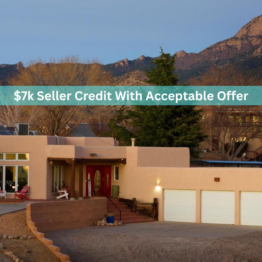 ** Motivated Seller! - With acceptable offer, Seller to consider $7K Buyer Credit to be used toward Buyer Closing Costs, Prepaids &/or Rate Buydown **North Albuquerque Acres property w/breathtaking views & well-designed layout. 2 primary BR's; 1 w/full bath & 2nd w/private entrance to back patio, 3/4 bath w/roll-in shower. Upstairs office, or fourth bedroom w/cozy corner kiva gas fireplace & balcony w/stunning views.  Improvements include; 7 mini-splits '21, wtr htr '25, septic '20, new blinds in some rooms, outdoor office '23, newer sinks and cabinets in primary 1 and hall bath, new light fixtures in entry, dng rm & nook '25. Professionally painted kitchen cabinets with new hardware '25 & new SS appl '25.  Granite island and pantry in kitchen w/separate coffee bar.