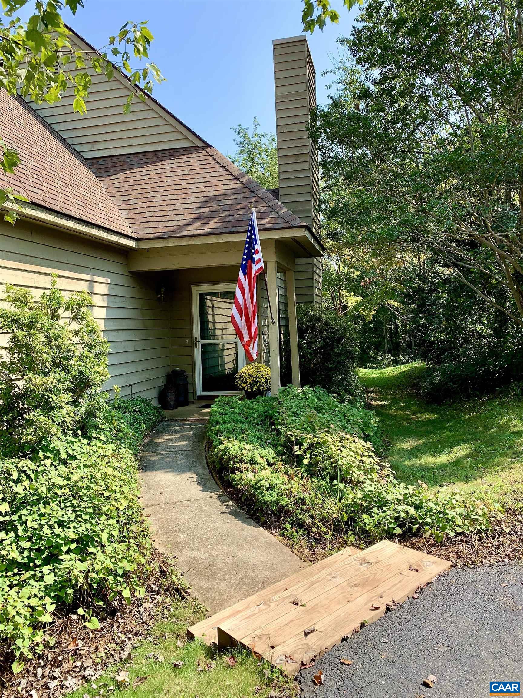 Affordable, light filled, one level living in Western Albemarle.  Large first floor Owner's Suite with walk in closet and first floor laundry.  Open floor plan with wood burning fireplace, kitchen island and custom built in bookcases.  Private patio and back yard. 3 bedrooms, 2 full baths plus a large additional Bonus Room. (19' 10" X 30') Original Owner. Needs some updating.