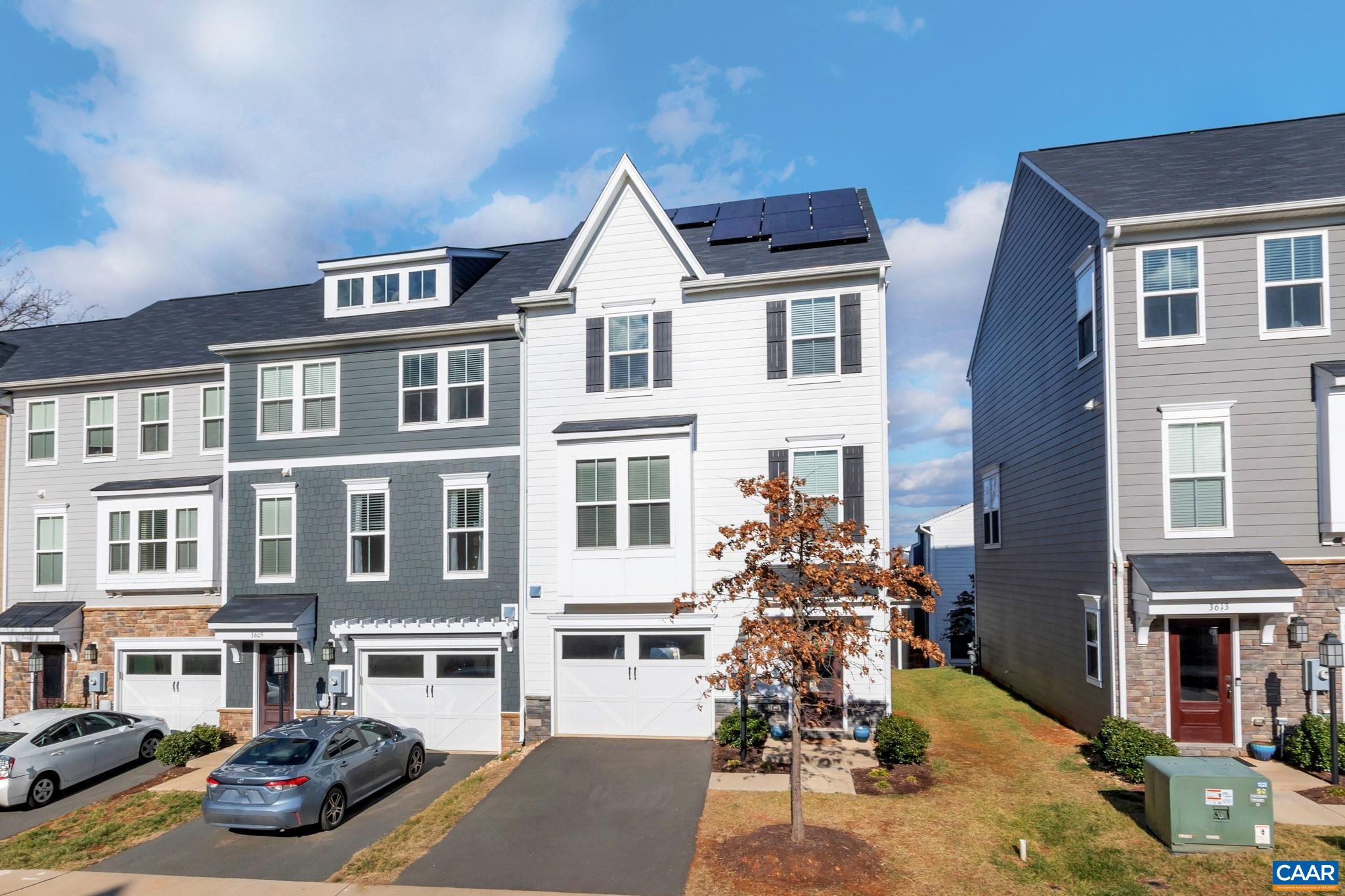 Beautiful views from the kitchen and deck, this perfect, gorgeous and bright townhome has it all. Terrace level has water and gas hooked up as well as a full bathroom and could be an office, playroom, man cave or 4th bedroom. When you walk in the front door, through the foyer and down hall there is a glass door that can be closed for privacy in the main area of terrace level.   This spacious 3 bedroom, 3.5 bath home is fully equipped with solar panels for significantly lower energy costs. High end LVP flooring in basement and upstairs living areas give the home a luxurious upgrade. The kitchen and living areas are bright, open and inviting. HOA also includes a nice dog park.  Dominion power bill attached in documents showing solar panel efficiency.