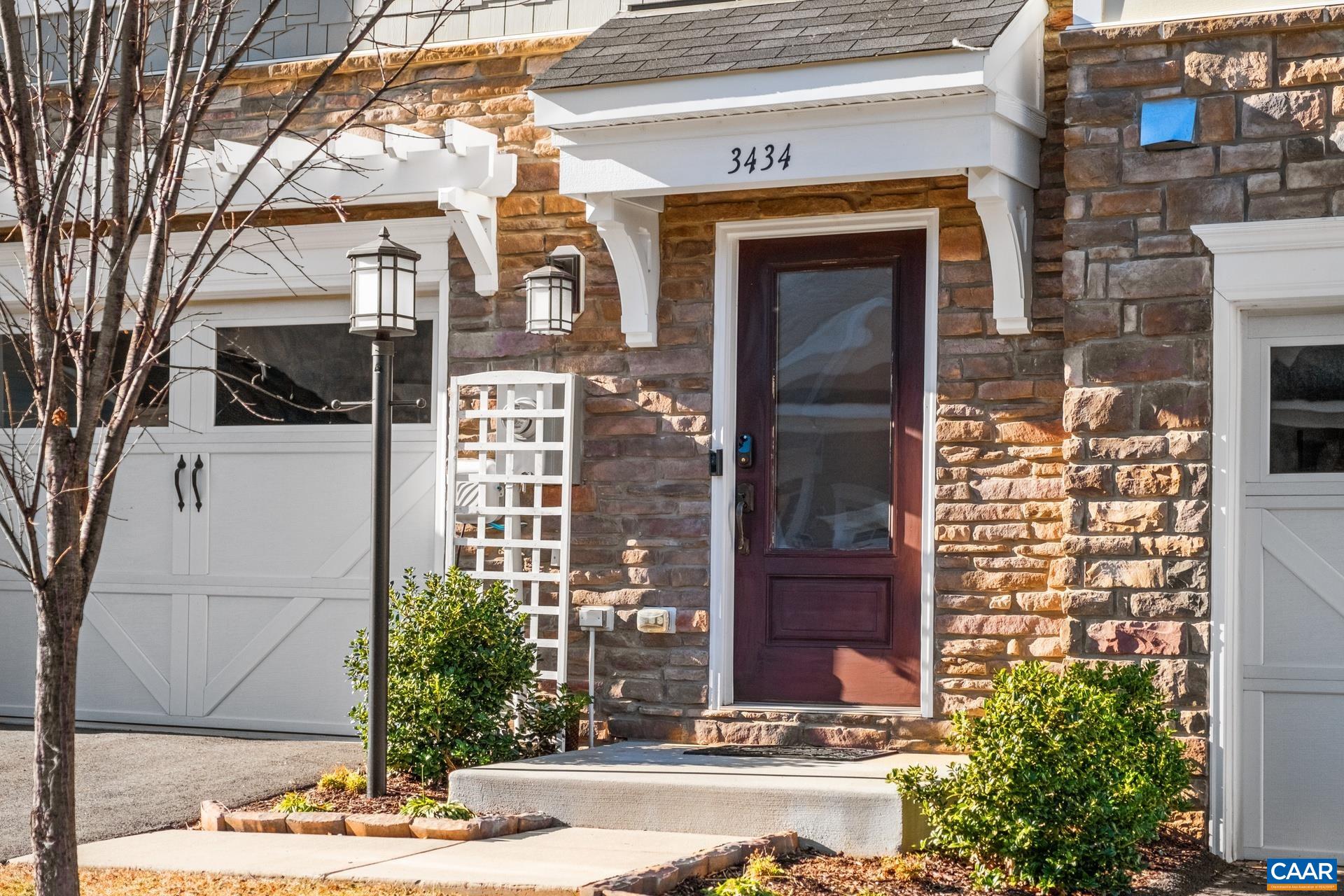 This beautiful luxury townhome has everything you want. As you enter you are greeted in a light filled foyer. The bottom floor has a great multi-purpose room which is a perfect guest suite with attached bath or additional large family/recreation room. On the main level you find an open floorplan including your living room, dining room & upgraded gourmet kitchen with oversized island. Enjoy the view of Carter Mountain from your living room. Perfect for entertaining inside & out with a lovely deck with plenty of space to cookout or relax. Head up to the bedroom level. There you'll find a large master bedroom with two closets including a walk-in & master bathroom with double vanities & beautifully tiled shower. Two more bedrooms including another with a walk-in closet, bathroom, & laundry complete that level. As a bonus, the pulldown attic stairs lead to additional storage space which is a rarity in a townhouse. Perfect location minutes from UVA, Downtown, Wegmans, & I-64. The Avinity neighborhood is a true community where neighbors know each other. Enjoy the dog park, clubhouse, playground & full gym or meet your neighbors at a wine social or weekly food truck. Come see your new home today!
