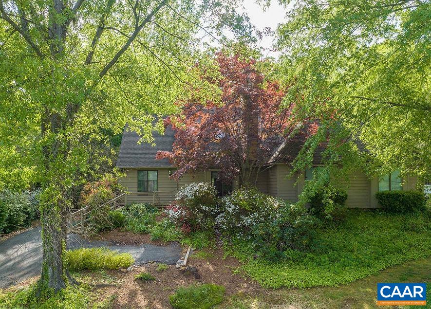 Nestled in the leafy community of Mill Creek, this cozy home is ready for its next owner’s vision. Features include a great room with a soaring ceiling, skylights, and a wood-burning fireplace. The open kitchen with recessed lighting leads out to a deck with additional storage and a lovely backyard. The main level primary suite includes a spacious walk in closet. Upstairs are an additional bedroom, bathroom, and large loft. HOA handles some exterior maintenance (siding, trim, roof), as well as some yard maintenance, snow removal, and trash/recycling pick up. Fast fiber internet available. Mill Creek is just a few minutes from Wegmans, 5th Street Station, UVA, and the Downtown Mall.
