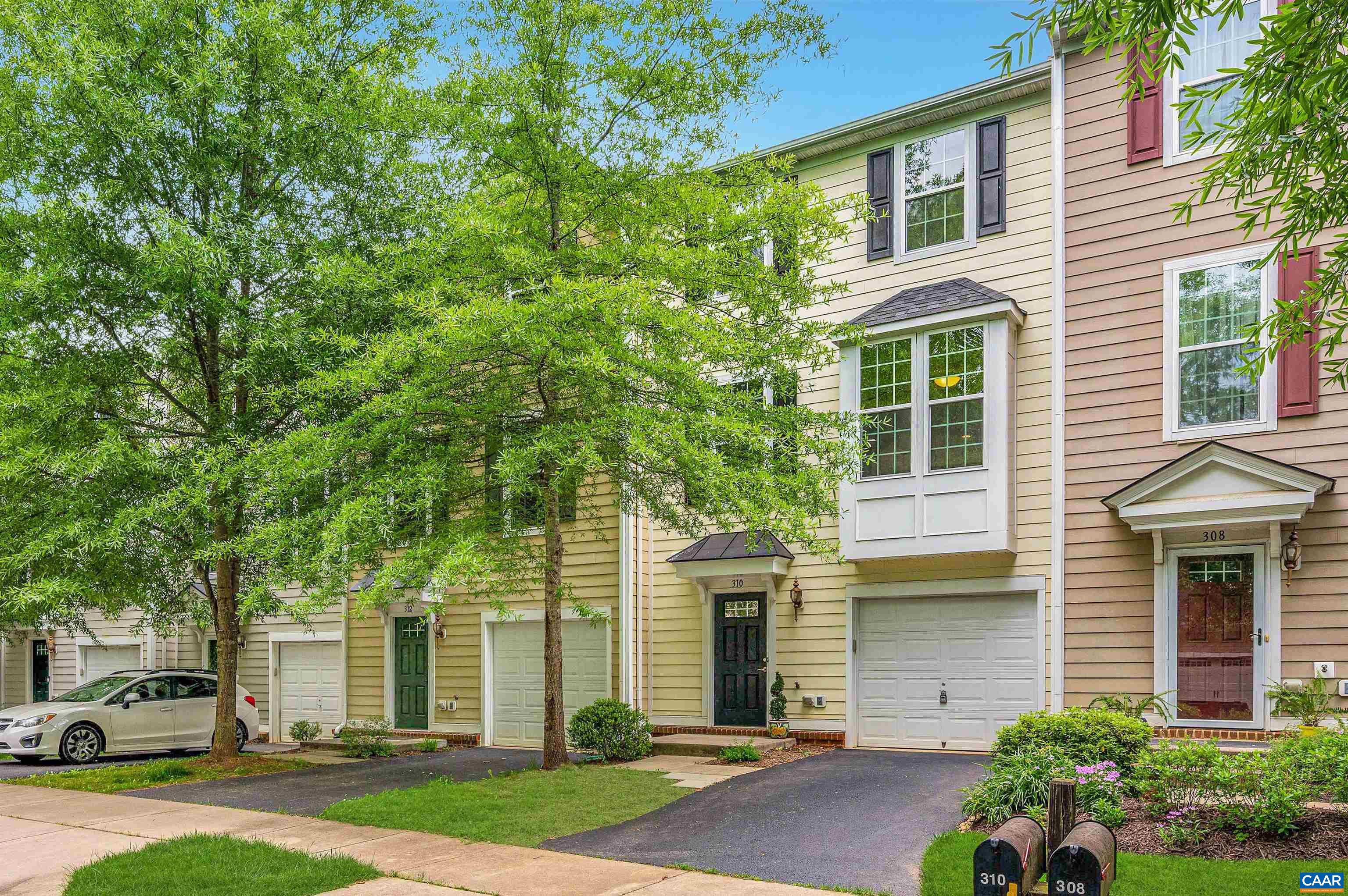 This well maintained townhome is nicely located in a small neighborhood with NO through traffic. This unit backs up onto the beautiful open space that has a nice big green field and a playground. It makes for a pleasant long view from the DR balcony, MBR, and 1st floor FR. This is a superbly convenient location! Walk to the grocery store, restaurants, hair salon, coffee house, bank, building supply house, and medical & dental services all w/in 5 mins! Access walking trails from the neighborhood that lead into the Crozet trail system and Crozet park and pool. School bus stop is one block away in the neighborhood for Brownsville Elem, Henley Middle, and W. Albemarle HS. Watch for the school bus from the kitchen! Nice open floor plan with living and dining areas open to the kitchen. Kitchen island has room for bar stools and workspace. MBR has large walk-in closet and a large attached bath with shower and separate bathtub. Hardwood floors, freshly cleaned carpets, new paint in many areas, new washer and dryer, new vanity in first floor powder room.  One car garage plus additional off street parking space in the private driveway. Lawn care and trash are included in the HOA fee. HOA is self managed and has kept the HOA fee reasonable.