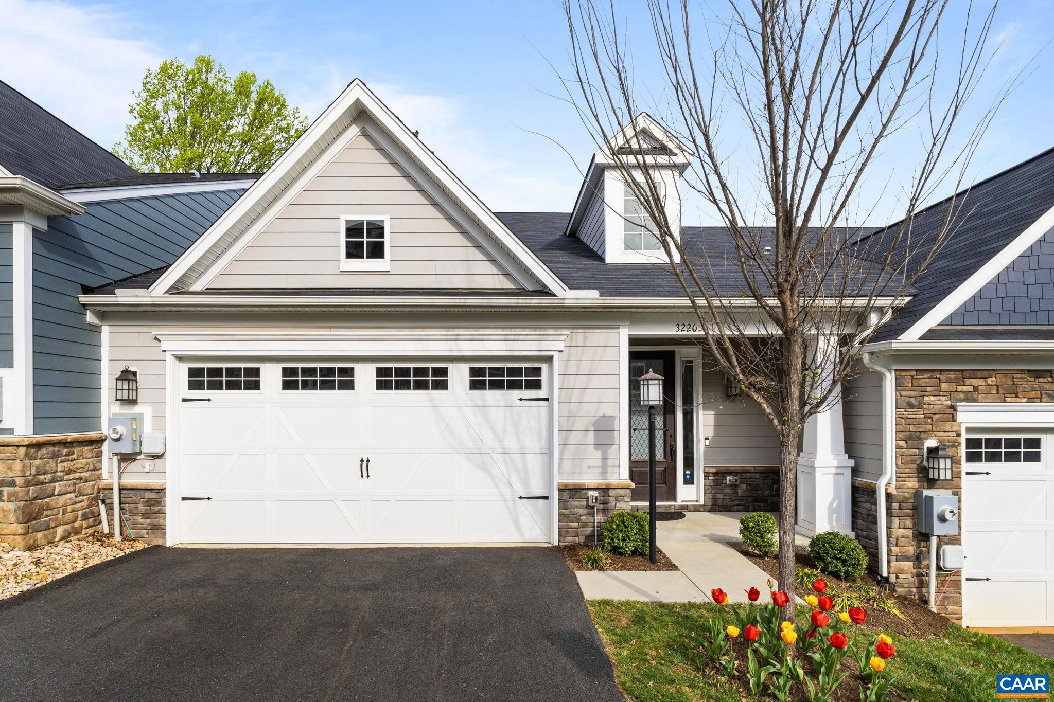 Welcome to this charming 3-bedroom, 2.5-bathroom villa nestled in the Avinity neighborhood, just south of 5th Street Station and Downtown Charlottesville. With modern construction completed in 2020, this villa offers an inviting open floor plan, perfect for both relaxation and entertaining. Enter into a spacious living area that flows into the kitchen and dining space, creating an ideal atmosphere for gatherings. The kitchen features sleek appliances, ample counter space, and a convenient breakfast bar. Also on the main level is the primary bedroom with attached bathroom that includes a tile shower, dual vanities, water closet, and walk-in closet. Upstairs find two additional bedrooms upstairs along with a full bathroom. A laundry room and a 2-car garage provide ample storage space and off-street parking.