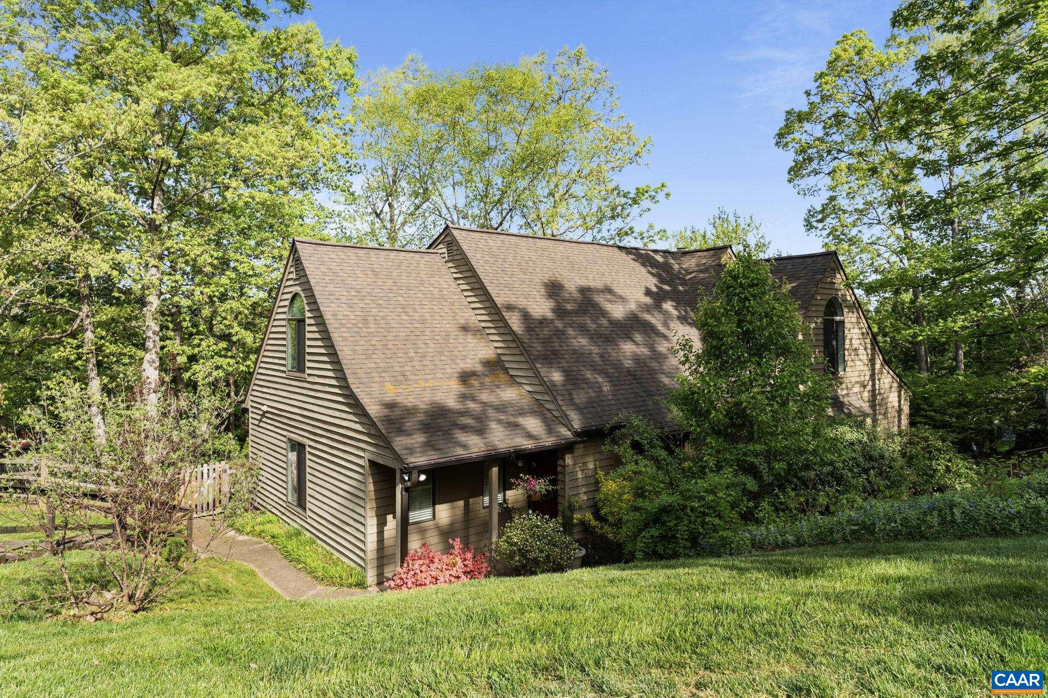 Located in the sought after Mill Creek neighborhood, this home offers low maintenance living with many lawn & exterior items covered by the HOA (mowing, trimming, pruning, roofs, replacement & painting of exterior siding and trim). Enjoy living in a neighborhood that adjoins the 1200+/- acres of green space & miles of trails offered by Biscuit Run Park along with the Saunders-Monticello Trails also close by. Enter the home into a cozy living rm with a soaring vaulted ceiling & large picture window. The eat-in kitchen features granite countertops, & breakfast bar. Main level primary suite includes a large walk-in closet & ensuite bath. Upstairs, there is a bedroom, full bath & an open loft area that offers a number of uses from an office, hobby area, yoga, etc. Outside, the rear deck complimented by landscaping, mature trees, & a fenced backyard, is such a wonderful oasis to enjoy many of your favorite things from morning coffee, reading, grilling, playing with pets, entertaining, & more. Other noteworthy features include: two off street parking spots, & a location that is minutes from those sought after sandwiches at The Market, Wegmans at 5th St. Station, Downtown Mall, UVA, & I-64.