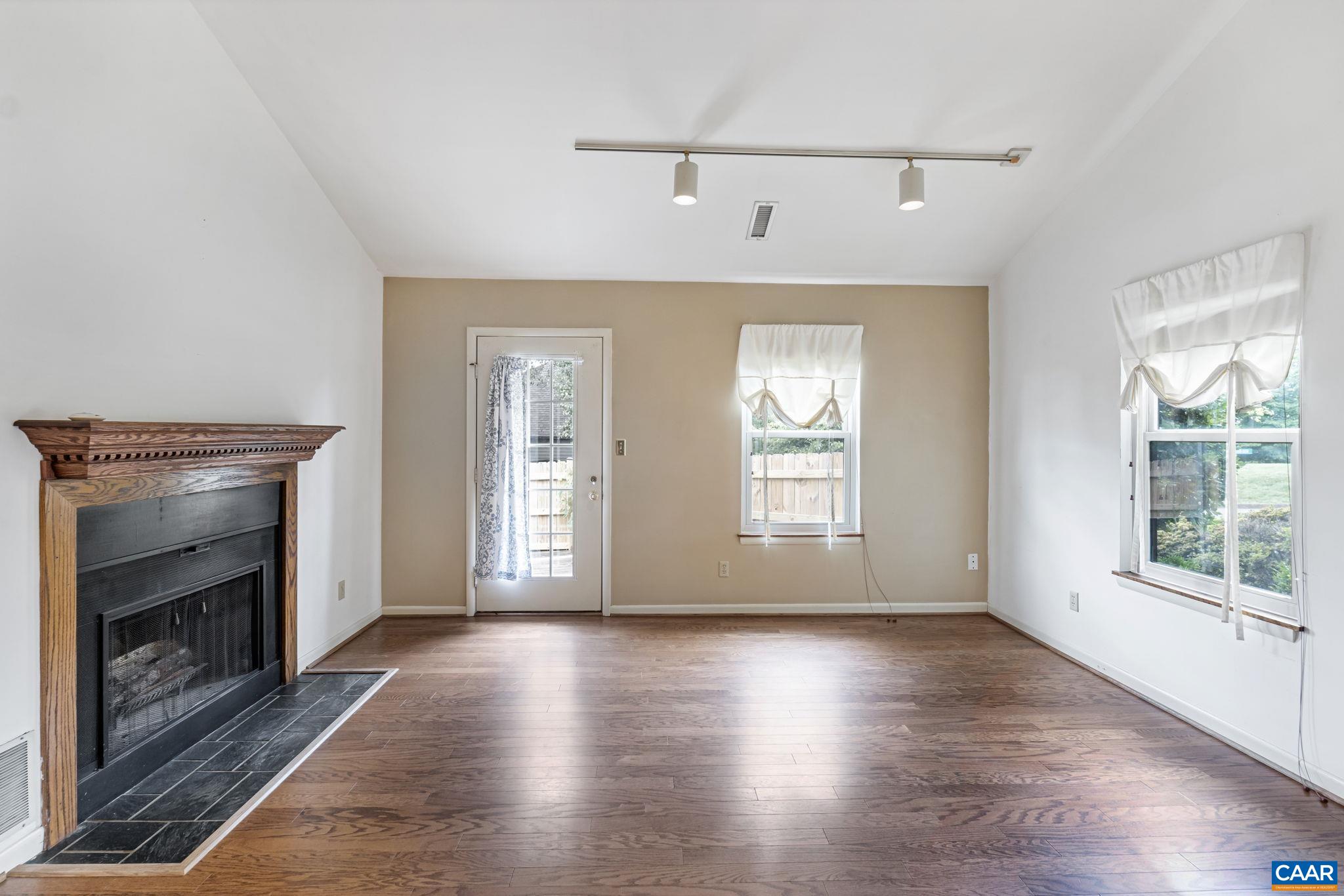 Wonderful one level home.  Great open and inviting floor plan. 2 Bedrooms 1 full bath. Wood burning F/P. Vaulted ceiling.  Hard wood flooring in all the public spaces.  Many upgrades. All new windows. Newer HVAC.  New roof.  All new fencing.  All new gutters.  A delightful private patio and grassy area for garden and a great place for the pets.  You will love this home.  Adjoining wonderful Penn Park with Golf, tennis, nature and fitness trails.  A great place to fly kites.  Situated in the ever popular neighborhood RiverRun.  RiverRun is a fun dog and cat friendly neighborhood.  There is also a community pool for those hot summer days.