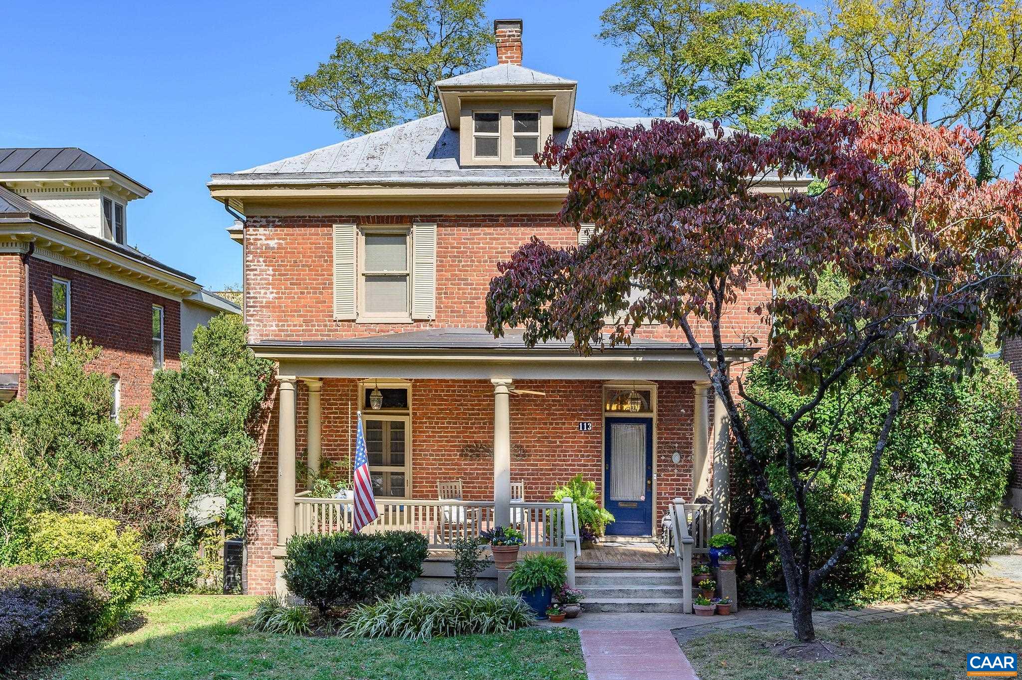 1920’s character abounds in this charming light-filled home tucked away on one of Downtown Charlottesville’s prettiest streets just a few scenic blocks from city parks, restaurants and shopping.  Original moldings and hardwood floors, dramatic foyer with fireplace, tall ceilings, deep welcoming front porch, and a truly remarkable backyard oasis with swimming pool are just a few of the special features that make this such a unique property.  Gorgeous heart pine flooring on the main level has recently been restored to it's original natural finish.  5 BRs and 3.5 baths, including a 1st floor primary suite/bath, & an elevator that services the main level and partially finished basement that has the potential for an in-law suite, nanny space, or teen hang out.  Beautifully landscaped yard features large shade trees, mature plantings, plenty of lawn, and three off-street parking spaces!  So much to love about this gorgeous home as it is, with endless opportunities awaiting a new owner’s personal touches.  Offered for sale for the first time in over 40 years, this stunning residence presents a unique opportunity in an unbeatable location.  Easy access to Main Street, UVA Hospital, UVA Grounds, Interstate 64, and the 250 corridor.