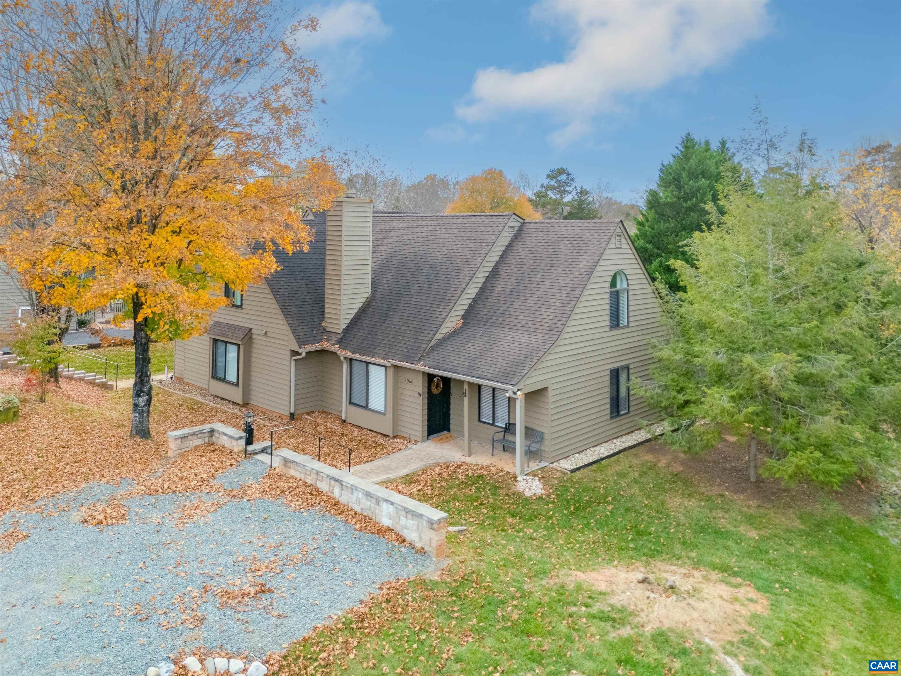 Discover this pristine cedar-sided end unit in the Highlands, where your fenced backyard meets wooded privacy – an increasingly rare find in Crozet. This thoughtfully designed 1,232 sq ft home, just 3 minutes to downtown Crozet and 15 minutes to Charlottesville, offers convenient main-level living with a primary suite, vaulted-ceiling living room, and an inviting eat-in kitchen that opens seamlessly to a spacious deck. Upstairs features two additional bedrooms and a full bath, perfect for family, guests, or a home office. The expansive deck and private backyard backing to trees create a peaceful outdoor retreat for year-round enjoyment. Well-maintained and lightly lived in, this home combines natural beauty with modern convenience in one of Crozet's most desirable communities. The perfect blend of location, privacy, and comfortable living awaits. Also, this home qualifies for a 1% rate buydown for the first year!
