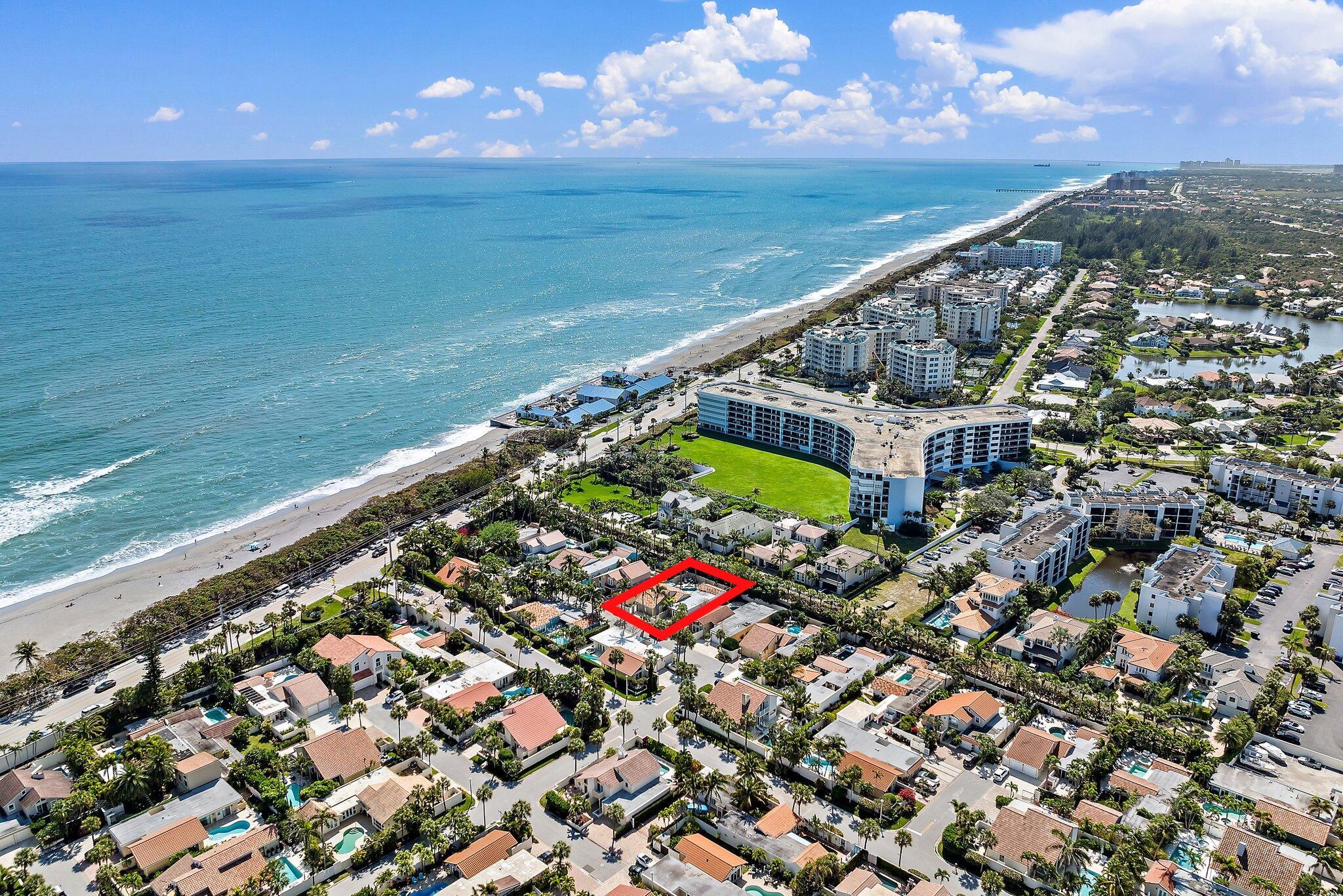 Steps from the sand. Center of the vibe.Located in Jupiter's gated Ocean Walk community, this 3-bed + office, 3.5-bath beach retreat serves up a rare blend of privacy, style, and surfside living. All bedrooms are ensuite, giving every guest or family member a private oasis. Recent updates include a 2021 flat roof, 2005 main home roof , impact windows, Subzero appliances, and a 2024 pool heater. Enjoy breezy mornings in your remodeled travertine courtyard or take a 2-minute walk to dip your toes in the Atlantic.The open layout is perfect for entertaining, while the saltwater pool, volume ceilings, and partial impact glass make everyday living feel like a vacation.Tucked inside a pet-friendly, walkable enclave, this home is for those who want Florida luxury without the fuss. and spa, and a private outdoor shower create a true resort-style experience&#x14;perfect for rinsing off after a day in the surf.

With exclusive beach access, morning strolls along the shore and breathtaking sunset views become part of your daily routine. Nestled on one of Ocean Walk's most sought-after streets, this home offers a serene, tropical sanctuary by the sea. Just minutes from Jupiter's top dining, shopping, and entertainment, this isn't just a home&#x14;it's a lifestyle.