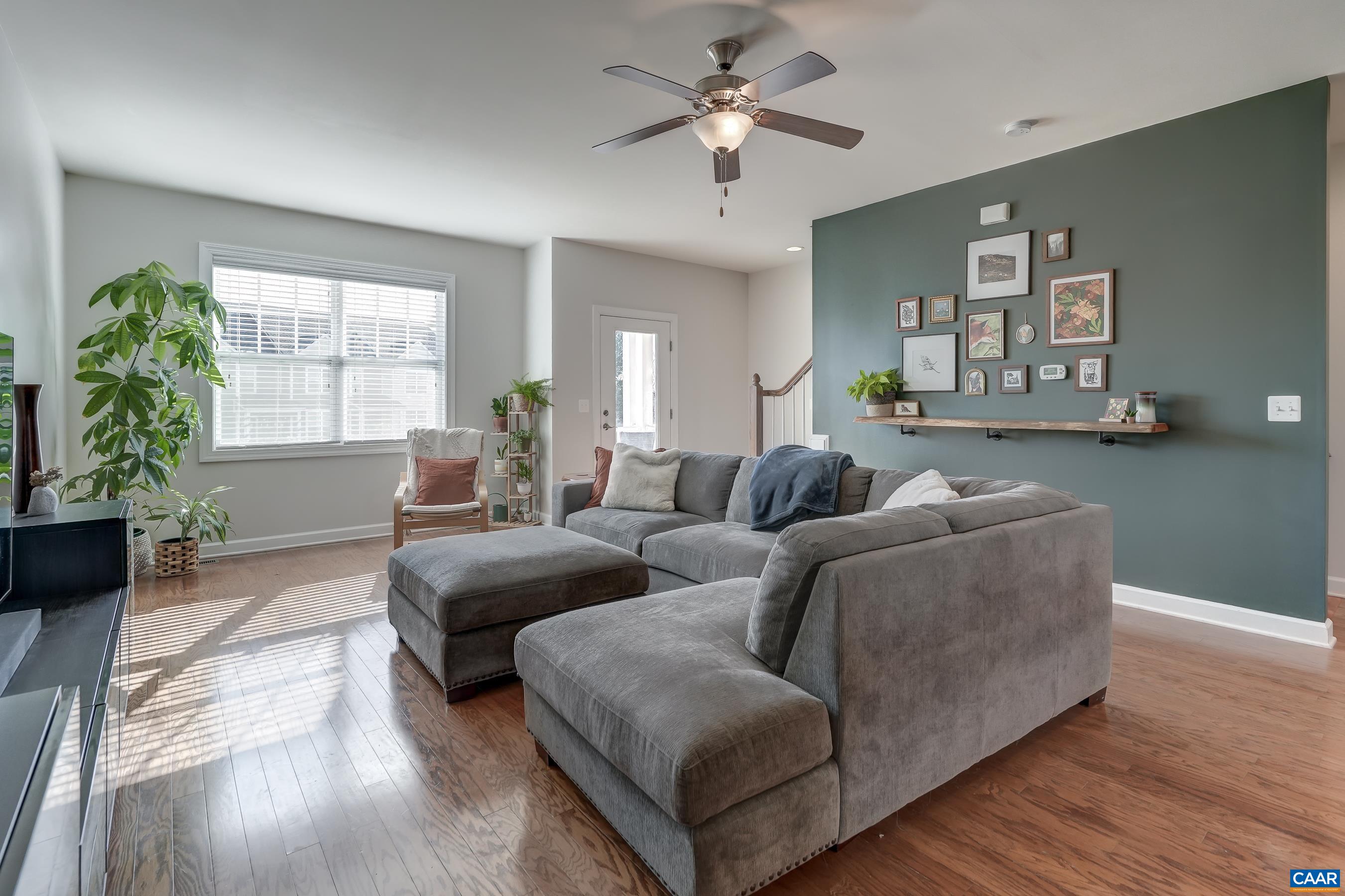 Wow! A spacious, move in ready home in Western Albemarle at a fantastic price! Walk to downtown Crozet and the town center in Old Trail. Fitness center, pool, park and restaurants nearby. This townhouse features an open concept main level, perfect for entertaining and comfortable living.The great room opens to the kitchen with espresso stained cabinets and stainless steel appliances. It also features a custom built-in entertainment unit. Dine in the spacious eat-in dining area or at the large bar in the kitchen. Upstairs, the owners suite offers a quiet retreat, two large closets, and a private bathroom. Two additional bedrooms share full bath. The stacked laundry is upstairs with the bedrooms for your convenience. The daylight ground floor features a fourth bedroom/home office, full bathroom and a 320 sq ft  additional space framed, insulated, heated and wired, ready to create a rec room or in law suite. Great location just outside of Old Trail and a few blocks to all that Crozet offers. Enjoy a low maintenance lifestyle with lawn care provided by HOA and two reserved parking spots right at your back door.  Easy on grade entry into home. A playground for kids and green space for your dogs right outside your front door.