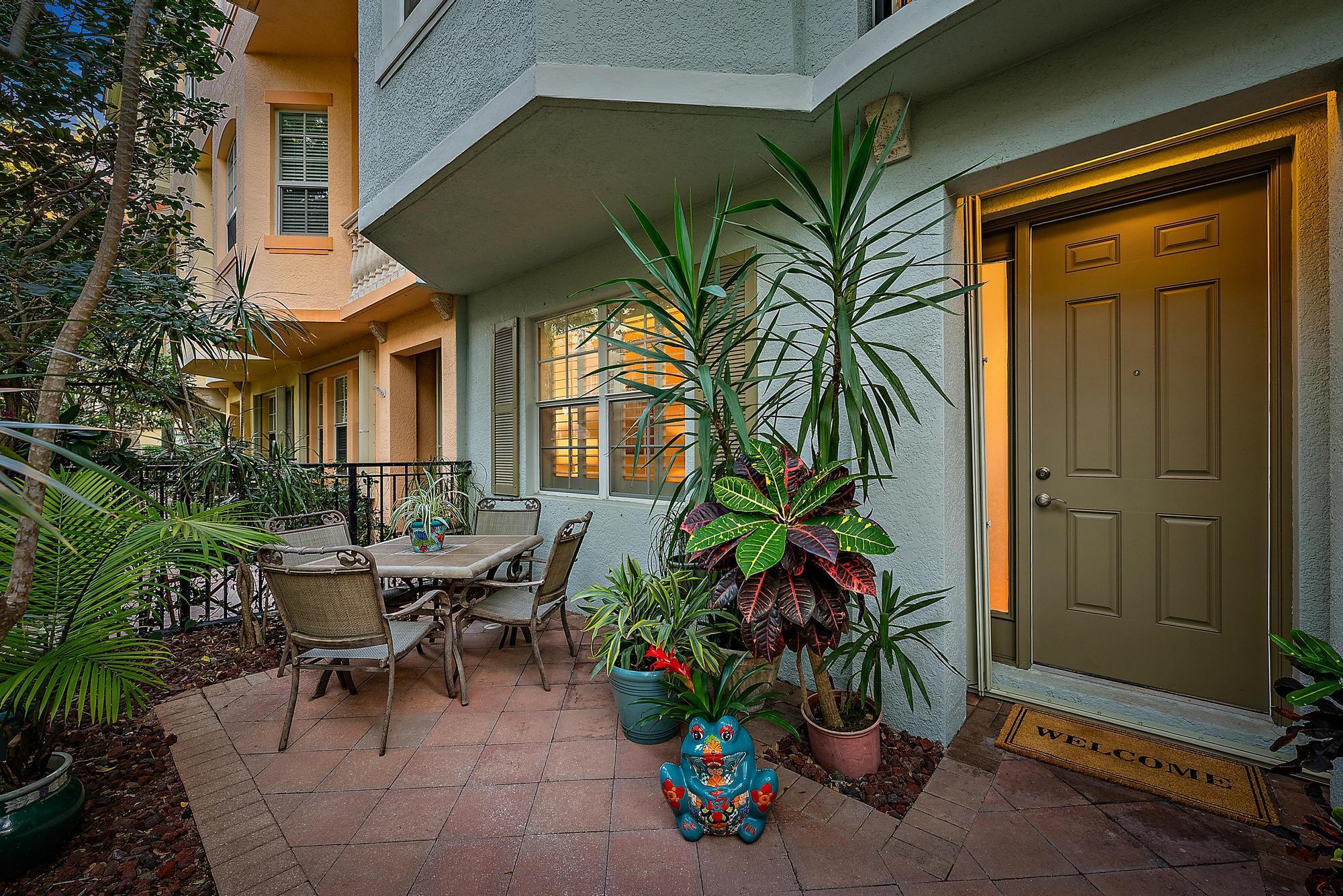 Unbelievable opportunity for an absolutely pristine townhome in the Gated community of Harbour Oaks. This townhome has been meticulously maintained and features newly installed engineered hardwood flooring, granite countertops with backsplash, and plantation shutters throughout the home. The first floor includes an oversized bonus room which can be easily converted to an office/ den/ or third bedroom with a full bath. Tray ceilings accent the primary bedroom, dining and living areas. This beautiful townhome has a terrific garden lot and the location has ample parking. Harbour Oaks has an ideal location, close to shops, restaurants, The Gardens Mall, easy access to both major highways, and just a short drive to the beach.