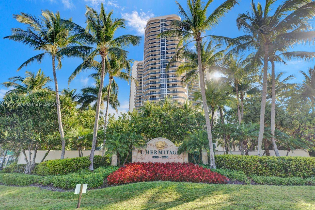 Live the luxurious lifestyle at gated L'Hermitage. Fully furnished, 2,000SF unit w/$30,000+ in recent updates! Breathtaking ocean & city views w/east & west balconies. Private elevator opens to bright space w/marble floors in main living area. Just painted, new modern lights, remote-controlled blinds, new art & furnishings. Primary suite offers king bed, 2 walk-in closets w/new built-ins, a linen closet & ensuite bath /Jacuzzi, shower, bidet, twin sinks & vanity. 2nd BR w/queen murphy bed & desk. 3rd BR is den. Eat-in kitchen, newer appliances. In-unit laundry, newer AC. Resort living on 10 acres along Ocean. Pools, hot tub, 2 tennis courts, on-site café, concierge, billiards, game room, library, state-of-the-art security, one garage spot w/guest valet parking. Walk to shops & restaurants!