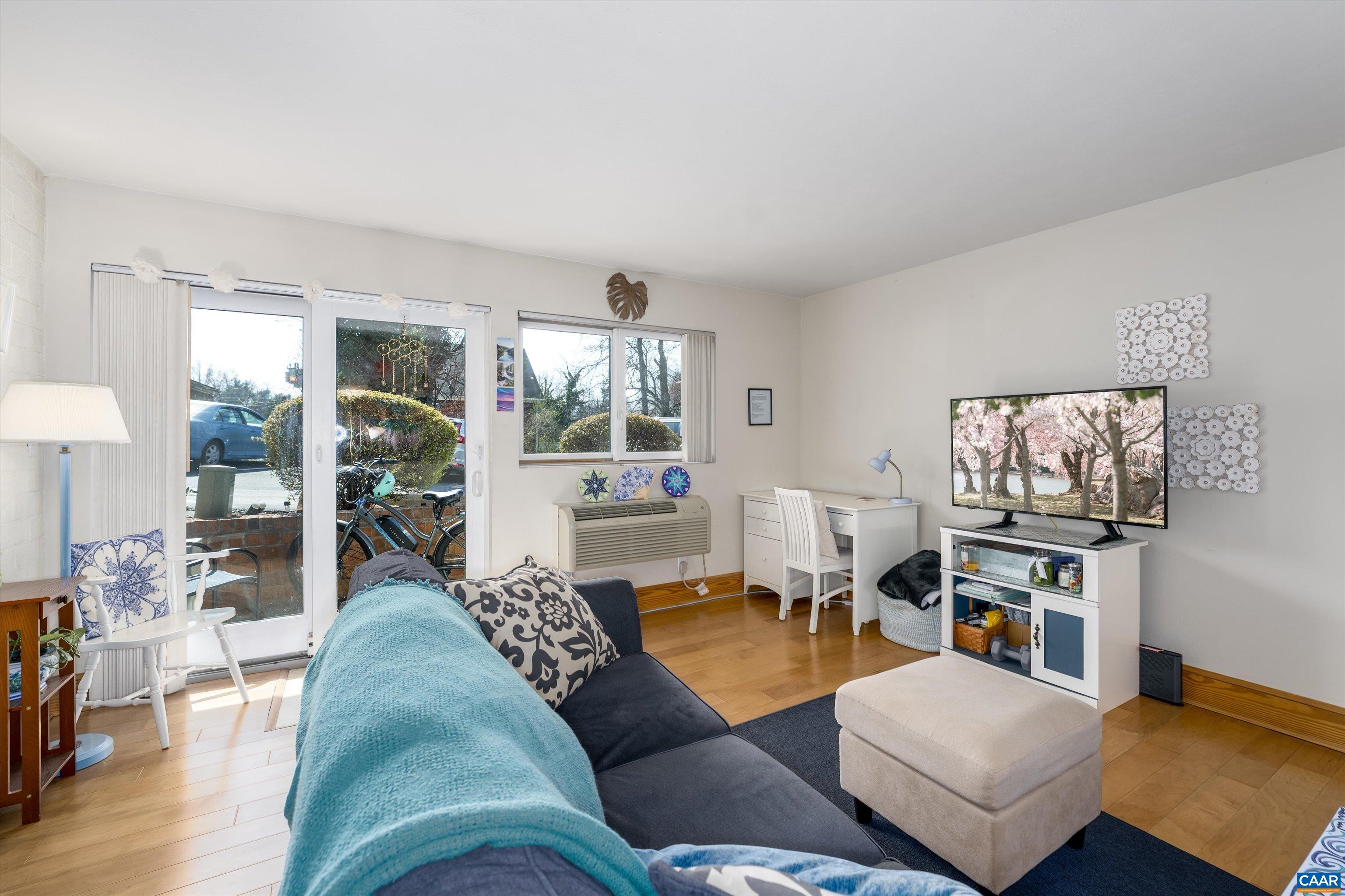This unit hits ALL the marks: clean, updated, comfortable 1 BR, 1 Bath, garden-level condo includes hardwood flooring in the living room, carpeted bedroom, and in-unit washer/dryer. Redesigned cabinets offer great storage. Within WALKING DISTANCE of UVA Hospital and grounds (also on bus line) to give you access to endless shopping, restaurants, and cultural amenities, while offering comforting shelter so that you can rest, replenish, and return to conquer the world.