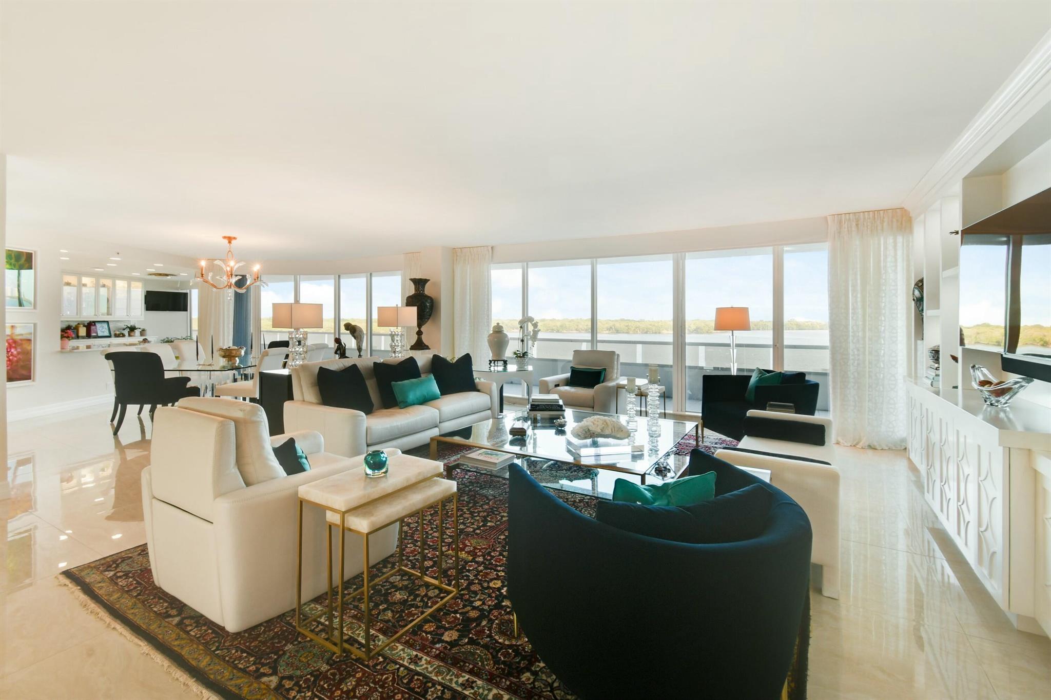 Welcome to Lake Point Tower, where luxury meets sophistication in an exquisitely designed residence. This exceptional home boasts high-end finishes, elegant decor, and breathtaking views of the intracoastal creating a sanctuary of comfort and style.Step inside to discover meticulously curated interiors featuring custom millwork, designer lighting, and premium flooring that exude timeless elegance. The spacious open-concept layout seamlessly connects the living, dining, and gourmet kitchen areas, perfect for both intimate gatherings and grand entertaining. Expansive windows invite natural light to flood the space. The luxurious primary suite offers a spa-like ensuite bath and generous closet space, ensuring a private retreat of tranquility and indulgence. Features include: High-End Appliances, Motorized Shades throughout, Tons of Storage, Large Laundry Room. This Condo comes with Two Parking Spaces
The amenities include access to a waterfront pool, fitness center, and 24 hour security. Conveniently located near fine dining, shopping, golf, and beautiful beaches, this home is the epitome of sophisticated Florida living.
Don't miss the opportunity to own this exquisite piece of paradise! Schedule your private showing today.