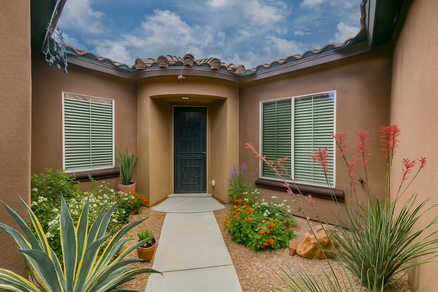 OWNER FINANCING AVAILABLE: Below market value & motivated seller...Located in the prestigious gated enclave of Tres Colinas, Loma Colorado, a residence of refined elegance unfolds. Dual primary suites, complemented by three additional bedrooms and three and a half baths. A chef's kitchen, showcasing bespoke cabinetry, artisanal backsplash, and stainless steel appliances, anchors the heart of the home, while granite surfaces grace every corner. A secluded courtyard and dual-zone climate control ensure year-round serenity. The huge great room adorned with built-in bookshelves and upgraded tile, opens to a generous covered patio, seamlessly blending indoor and outdoor living. Custom window treatments, expansive closets. A dedicated laundry room and formal dining area complete the ensemble