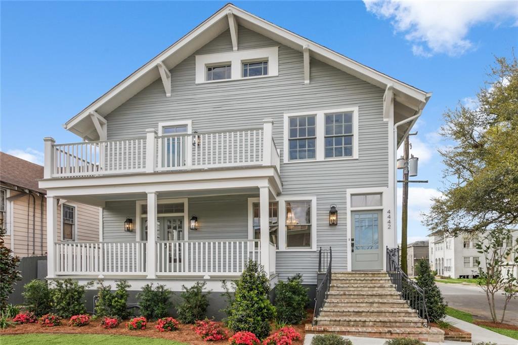 Modern Elegance Meets Historic Charm in the Heart of New Orleans!  Welcome to this stunningly renovated home in a quiet neighborhood on a prime corner lot in the desirable Uptown area.  Renovated inside and out, this 2-story beauty blends timeless architectural details with luxurious modern updates - from the inviting front porch and upper balcony to the gleaming hardwood floors and high ceilings throughout.  Step inside to an open-concept living space filled with natural light, detailed crown molding, and designer finishes.  The chef's kitchen is a true showpiece featuring quartz countertops, custom cabinetry, high-end stainless steel appliances, and statement pendant lighting over the oversized island - perfect for entertaining.  This fabulous condo includes 4 nice size bedrooms all with ensuite baths.  First floor has a guest or primary bedroom suite, living/dining & kitchen with access to charming private front porch overlooking professionally lush landscaped front yard.  The upper level features three spacious, beautifully appointed bedrooms, each with it's own private bath—offering comfort and privacy. As well as a large laundry room.  Upstairs, the spa-inspired primary suite boasts a marble-tiled bathroom with a freestanding soaking tub, glass walk-in shower, dual vanities, and gold hardware that adds a touch of glam.  Added bonus to primary bedroom is private access to front balcony.  Plenty off-street parking.  Must see this beautiful condo flooded in natural light and surrounded with views of beautiful professional landscaping with irrigation system!   Super close to hospital & medical services with easy access to public transportation. Seller offering 10 hours of interior design with assigned designer and $2,500 towards moving expenses.