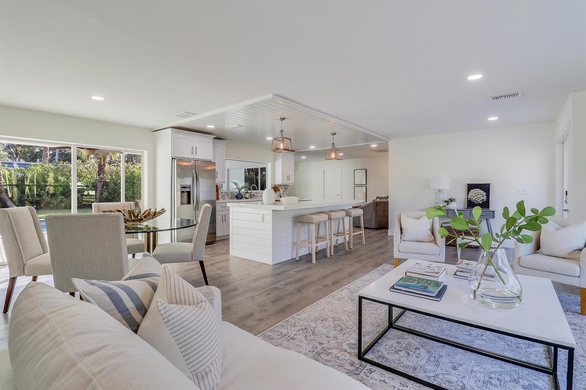 Come home to BERMUDA TERRACE!  Welcome to 19228 Caribbean Court, a captivating residence nestled in the highly sought-after Bermuda Terrace community in Tequesta, FL. This stunning 4-bedroom, 2-bathroom CBS pool home offers a meticulously renovated living space, perfectly situated on a generous lot.This home offers a beautifully updated interior featuring impact glass windows and doors, a durable metal roof, and a spacious 2-car garage. The heart of this home is the chef's kitchen, boasting elegant quartz countertops and stainless steel appliances. Adjacent to the kitchen, a huge interior utility area with washer and dryer adds convenience to your everyday routine.Outside, enjoy the newly laid sod and fresh landscaping, creating a picturesque setting for your outdoor gatherings. The covered patio, adorned with charming tongue and groove ceilings, overlooks the inviting pool&#x14;perfect for relaxation and entertaining. A 500-gallon whole house generator ensures peace of mind year-round.

For those passionate about water activities, Bermuda Terrace offers exclusive amenities, including a gated ramp, tiki hut, and picnic area (accessible for a yearly fee) and wet &amp; dry slips (for fee and currently on a wait list) with easy access to the Loxahatchee River, Intracoastal Waterway, Jupiter Inlet, and the Atlantic Ocean.  This home is a haven for boating, fishing, and paddleboarding enthusiasts. 

Amazing schools, local shops &amp; restaurants, the beach and public parks all within a short distance.  Don't miss this rare opportunity to own a piece of paradise in unincorporated Palm Beach County's most desirable Tequesta neighborhood!