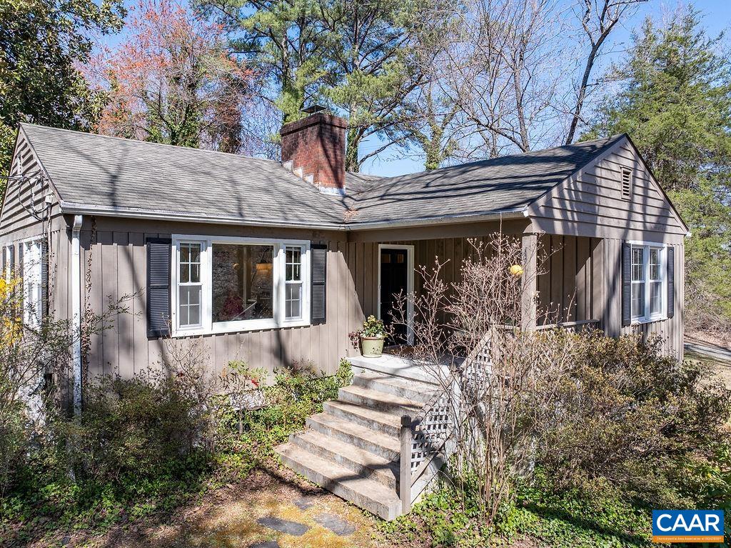 Charming light filled, City cottage, with exceptional privacy, and excellent proximity to everything C'ville.  Enjoy easy access to walking trail and adjoining park, large private backyard, off street parking, one car garage, storage galore in unfinished basement and room for expansion.  Additional features include hardwood floors, 2 wood burning fireplaces, lots of windows providing natural light, bringing the outdoors in!  Entertain on the spacious covered front porch, or dine on the backyard deck, under the shade of the majestic Magnolia tree, surrounded by nature.  The yard can be a gardener's delight or remain very low maintenance with established plantings. Ample yard space for recreational activities. Minutes from UVA (1.8 miles), Sentara Martha Jefferson Hospital (3.6 miles), Stonefield Shopping Center/Trader Joe's (2.1 miles), Whole Foods (1.7 miles), Downtown Pedestrian Mall (1.8 miles) and so much more!  Open House on Sat., 8/2 & Sun., 8/3, from 1-3 pm.  Stop by to see this downtown gem, with a generous size lot!  You will be glad you did!