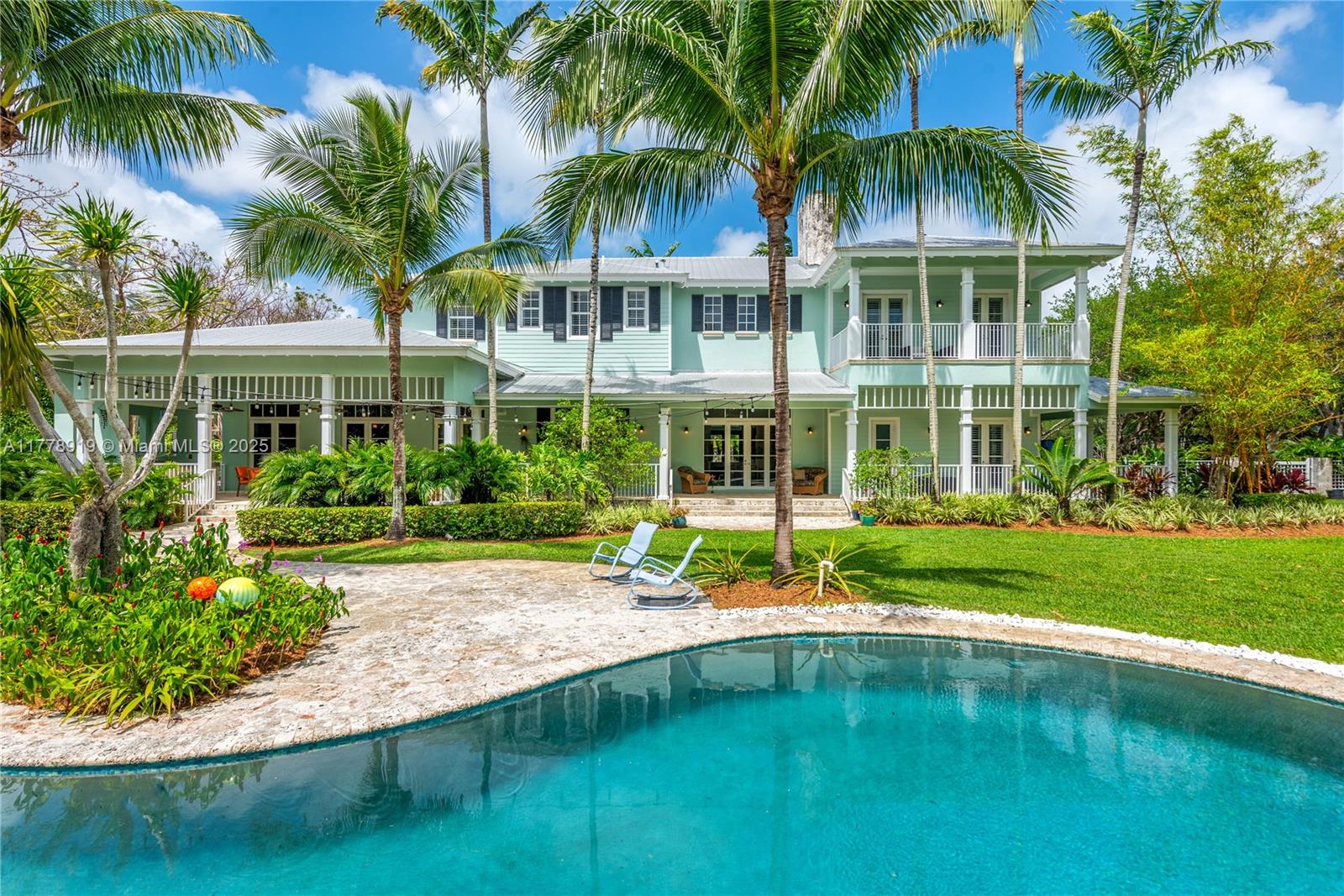 Located in the heart of Pinecrest on a picturesque 45,738 SF lot, this 7,763 SF Key West style home is a true sanctuary!  Built in 2007, it features a spectacular & deep wrap-around porch that serves as outdoor living space, including a summer kitchen overlooking the resort-style pool.  The welcoming floorplan has a double-height foyer entry w/ sweeping staircase, formal liv & din rms, office, chef’s kitchen w/ eat-in area, & spacious family room.  Located on the 2nd floor, the primary suite has a private balcony, 2 walk-in closets, & a large bathroom including dual sinks, separate tub & shower, + vanity area.  There are 6 add’l BRs & 5.5 more BA’s as well.  With a 3 car gar, impact glass, generator, coffered ceilings, laundry room, & much more, this is the perfect place to call home!