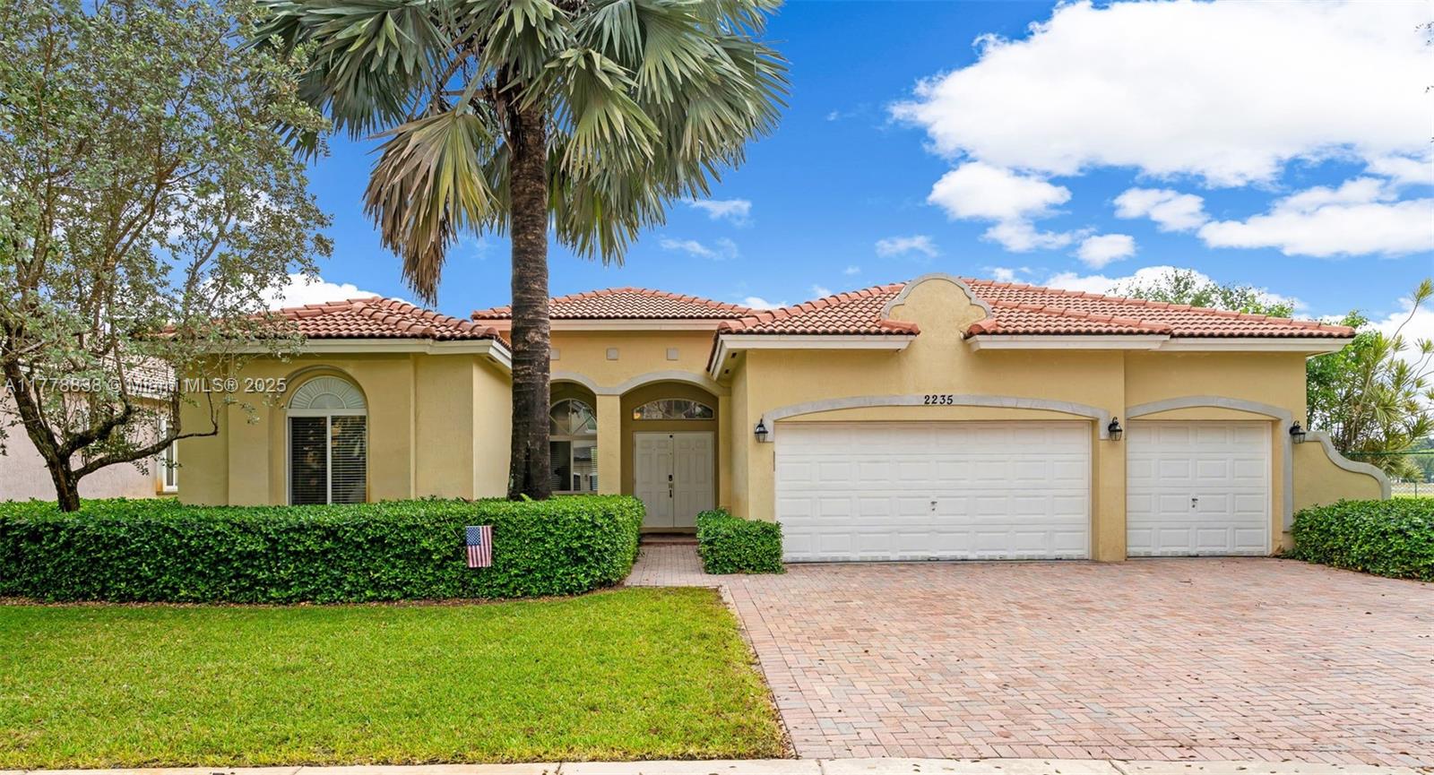 BEAUTIFUL PALM ISLES ESTATE HOME W/ GOLF AND LAKE VIEW. This spacious 4BR/3BA pool home with 3 car garage sits on an oversized premium lot w/ fabulous views of the lake, golf course & pool. Offering a split open floorplan with a large great room that opens up to the kitchen, breakfast area & family room. Kitchen has granite countertops, 15x14 island, Stainless-Steel appliances & walk in pantry. Tile in all living areas, large master suite w/ double vanities, separate shower & Roman tub. Step out onto your covered terrace to enjoy the beautiful sunrise in the morning or roll the screened shades down for some afternoon shade. Fenced in yard. Gated community w/ roving security, tennis and pickle ball courts and an up and coming new golf course & clubhouse. Make your appt today!