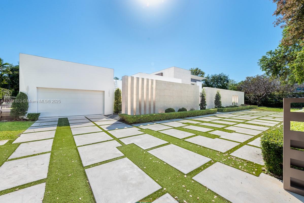 Discover this stunning 6-bedroom, 6.5-bath estate on a 33,000 sq.ft. lot, thoughtfully designed for luxurious vacation living. Fully renovated and expanded, this elegant masterpiece offers a seamless blend of comfort and entertainment, ideal for families who love to host. Inside, enjoy a luminous open layout with all en-suite bedrooms for ultimate privacy. The gourmet kitchen is equipped with high-end appliances, dual dishwashers, and an oversized laundry room. Five brand-new A/C units ensure year-round comfort. Step outside to your private resort oasis, featuring a breathtaking swimming pool, serene ponds, outstanding landscaping, and expansive outdoor living areas perfect for entertaining or relaxing.
This is more than a home — it's a lifestyle. Schedule your private tour today!