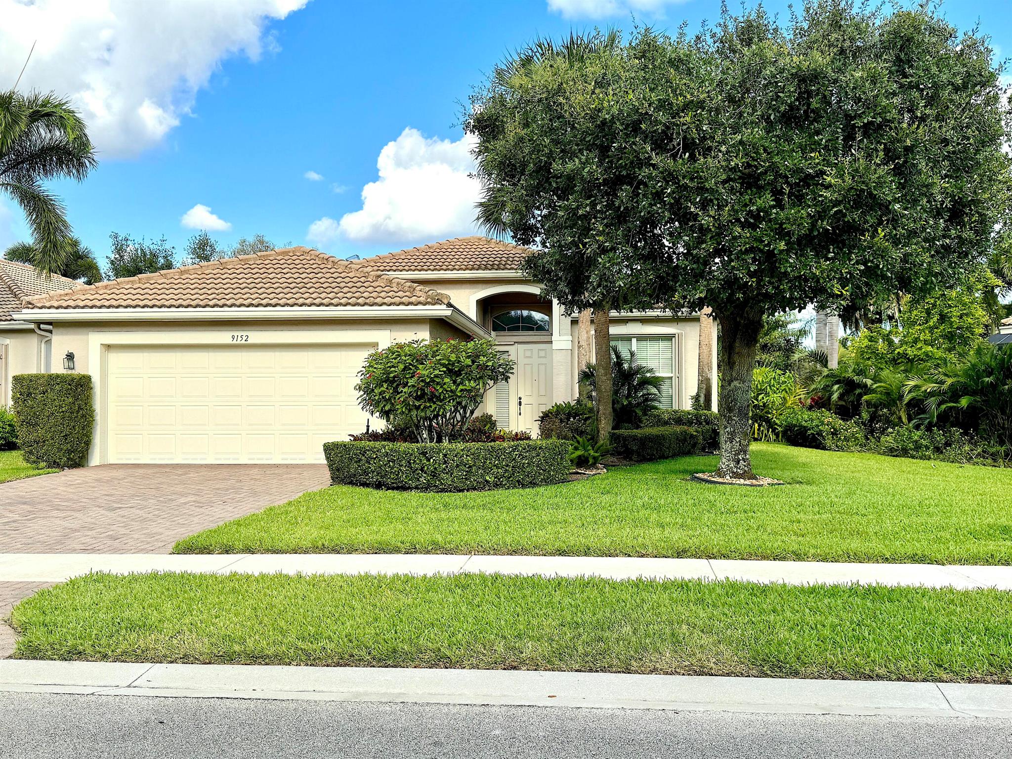 Just Steps from the Clubhouse... Welcome to your dream home in the sought-after community of Valencia Reserve! This lovely Isabelle model boasts a premium water lot and is located just a short stroll from the vibrant clubhouse. Enjoy cooking and entertaining in the gourmet eat-in kitchen, featuring rich wood cabinetry, a double pantry, GE black appliances, a stylish tiled backsplash, and a convenient counter-height bar. The formal dining room and spacious great room provide the perfect setting for gatherings and relaxation. The expansive primary suite offers a tranquil retreat with a tray ceiling and ample closet space. Step outside to a  extended open patio and enjoy your beautiful view! Welcome Home!!!