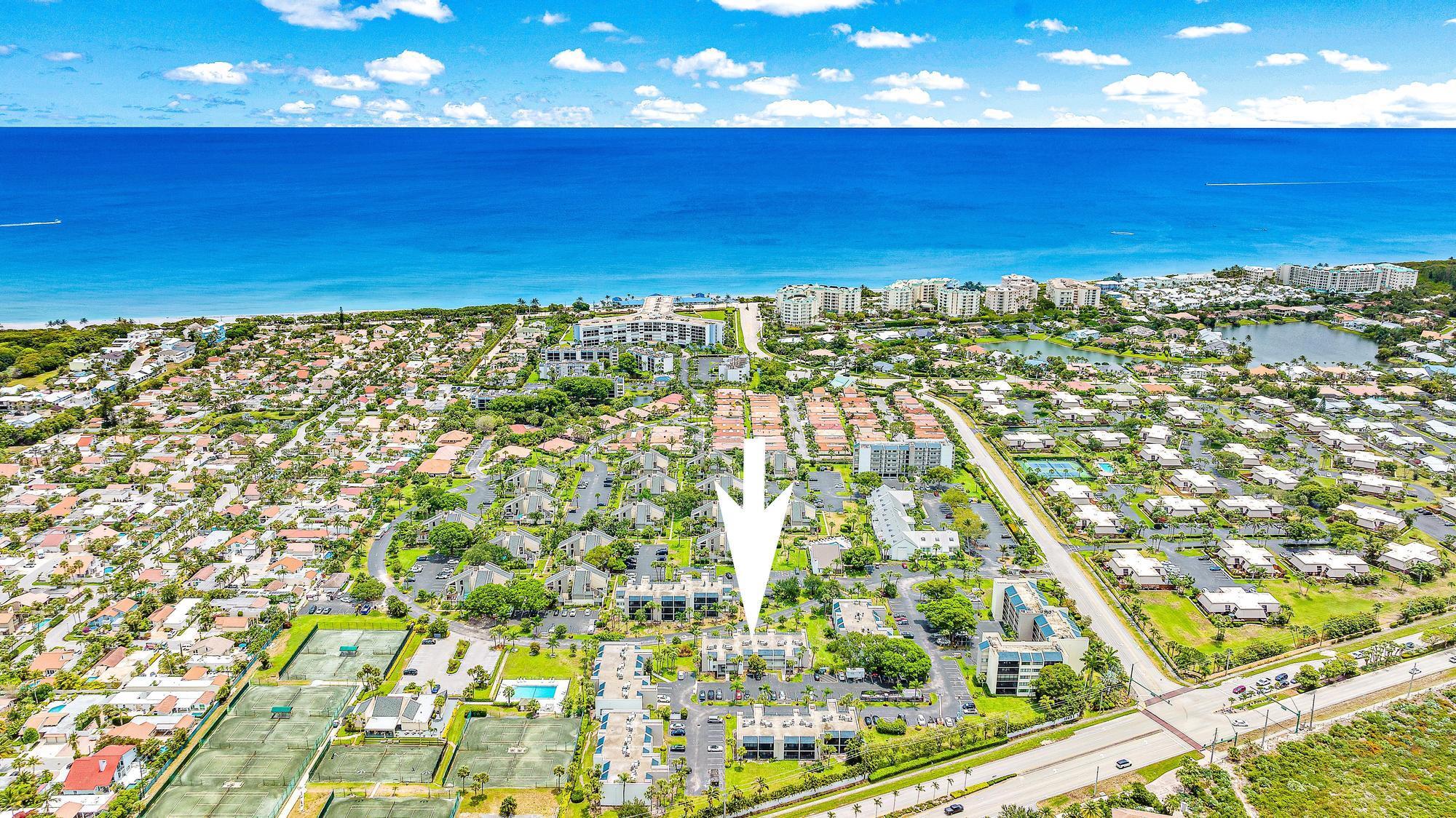 COASTAL LIVING MADE EASY! Move right into this beautifully furnished, thoughtfully upgraded 1-bedroom, 1.5-bath condo, just bring your personal items! Features LVP flooring throughout, a new kitchen with soft close shaker style cabinets, quartz counters, & newer stainless appliances. Master bathroom has also been remodeled. Ideally situated just a short stroll from the pristine shores of Jupiter Beach, this charming residence radiates a relaxed, beachy vibe. Enjoy the perks of resort-style living with access to a community clubhouse and sparkling pool. You're also just minutes from upscale dining, premier shopping, and exciting local attractions. Conveniently close to Palm Beach International Airport (PBI), travel is a breeze. Whether you're looking for a serene year-round escape or a high-potential investment (with rental allowances up to 12 times per year, 30-day minimum), this condo delivers it all. 1 pet 20 lbs or under, no pickup trucks allowed!
