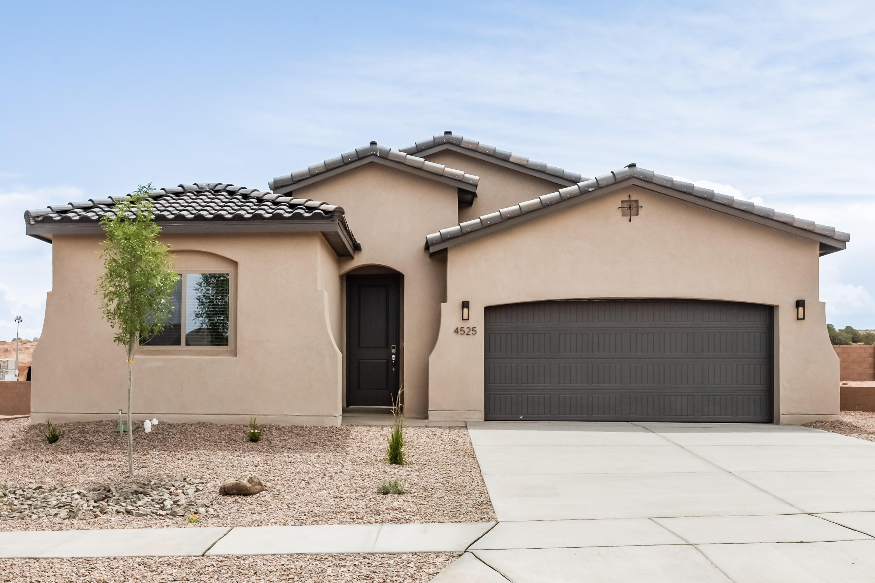 Introducing the Tabitha II, an exploration of our versatile single-story 4-bedroom home designed for adaptability. 4-bedroom double suite home. The focal point is the large kitchen island, perfect for gatherings, while the well-proportioned secondary bedrooms add to the functionality. Step outside and enjoy the covered patio, providing a perfect spot to relish the beautiful New Mexico sunsets. Experience a home that evolves with your needs, offering both style and practicality. In honor of Tabitha Babbitt, this residence pays tribute to inventiveness and adaptability.