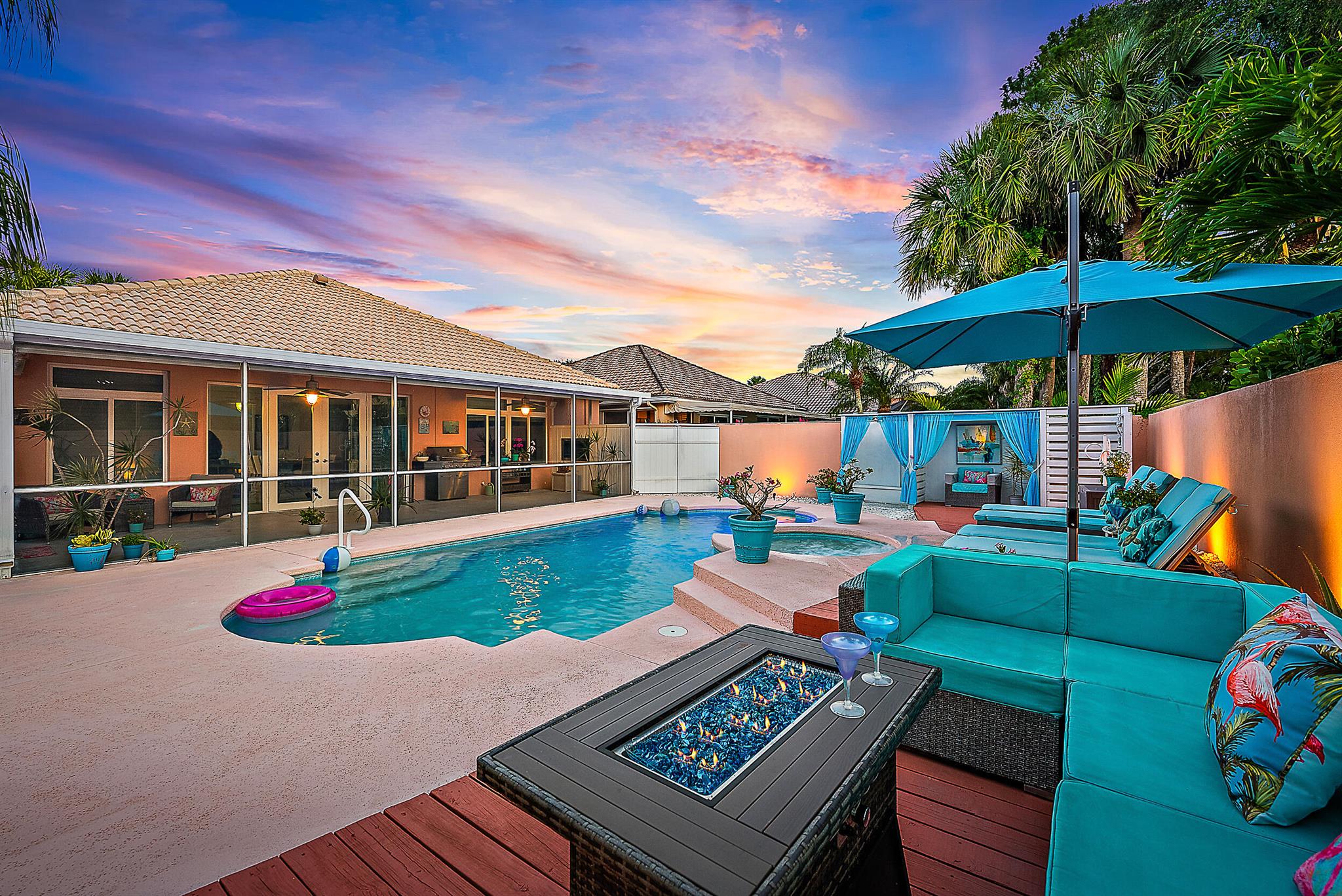 Welcome to your Florida dream home in the highly desirable, family-friendly community of The Hamptons at Maplewood in Jupiter. This beautifully renovated, DiVosta-built residence offers the perfect blend of sophistication, comfort, & the effortless charm of Florida living--completely move-in ready & designed to impress. Stylish, open concept living! Step into a bright & airy layout crafted for both everyday living & elegant entertainment. The heart of the home is the chef-inspired kitchen, featuring: an oversized quartz island, double wall oven with built-in microwave, sleek electric cooktop, & wine cooler. Whether you're hosting guests or preparing a quiet family dinner, this kitchen is sure to inspire! Luxury finishes &amp; modern comforts, luxury vinyl plank flooring throughout, custom window treatments, modern LED lighting for style &amp; energy efficiency, all-new impact-rated windows &amp; hurricane-rated garage door, etched/frosted front door with accordion shutter, &amp; updated plumbing. The spacious two-car garage has been freshly painted &amp; fully organized, offering a clean, functional, &amp; visually appealing space ready for storage, hobbies, or parking. Resort-Style outdoor living! Escape to your private backyard oasis featuring: Heated propane pool &amp; spa, oversized screened-in patio with rear impact French doors, elegant cabanas, &amp; lush tropical landscaping. Completely walled outdoor living space for added privacy. Additional Features: Renovated guest bathroom with contemporary finishes, tacked &amp; clipped hip roof for architectural appeal &amp; durability, high-end upgrades throughout. This home truly has it all; modern luxury, thoughtful updates, &amp; a prime location in one of Jupiter's most beloved neighborhoods with low HOA fees! Don't miss this opportunity to own a slice of paradise in The Hamptons at Maplewood. Schedule your private showing today. Welcome home!