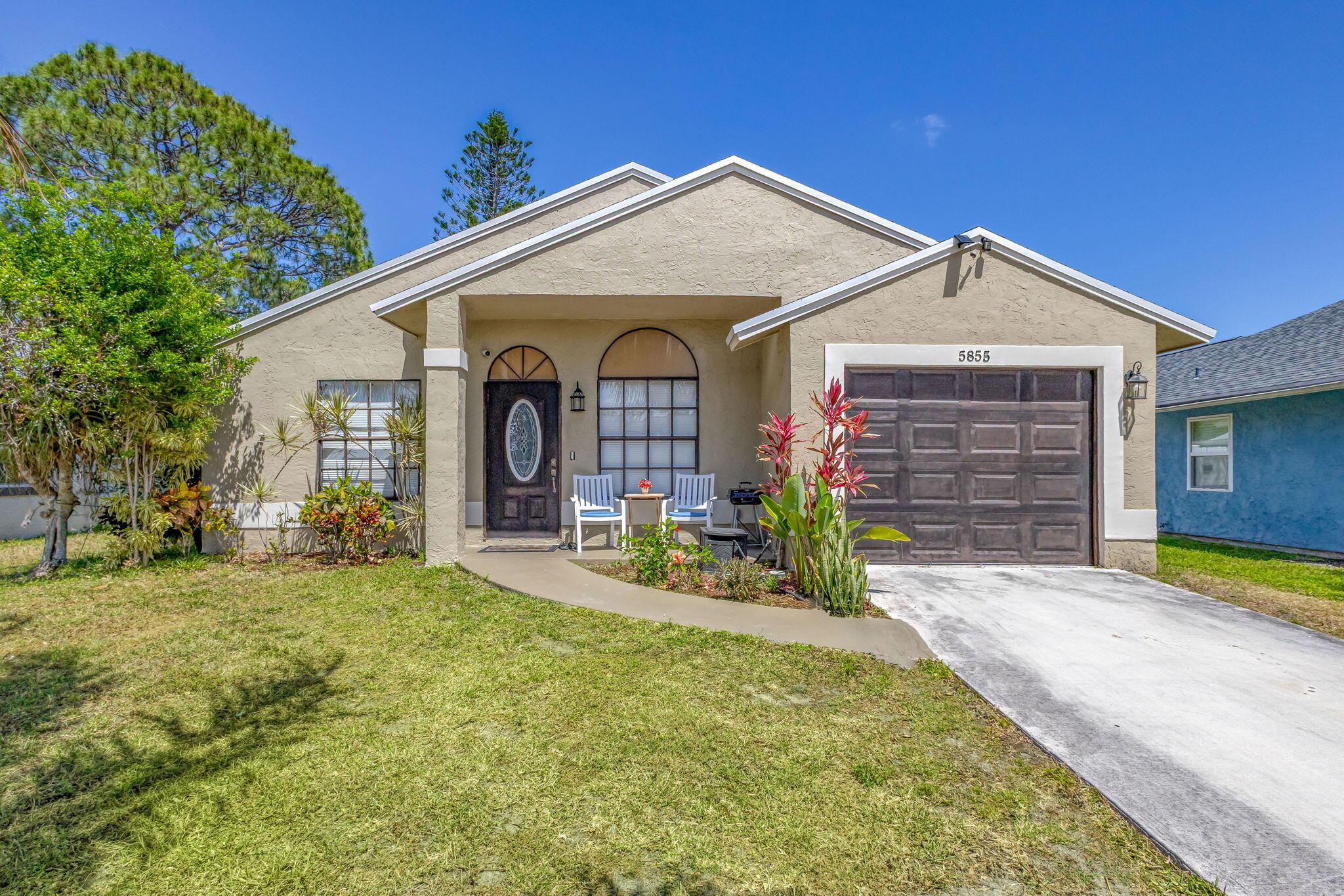 Photo 2 of home located at 5855 SE Mitzi Lane, Stuart FL