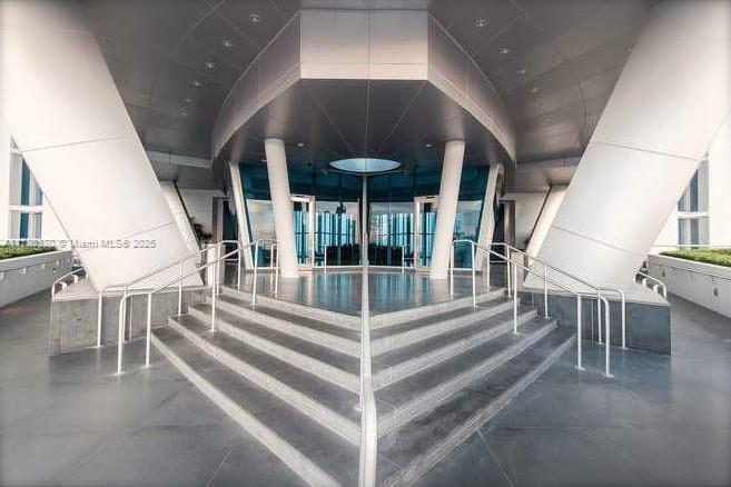 This direct oceanfront residence offers a one-bedroom layout + den, ideal for sleeping or working space. Used exclusively as a second home by owner, this condo is very well maintained. $100,000 in upgrades. The sale of the unit will also include a private, air-conditioned storage space valued at $30,000 + 1 assigned parking, besides valet. Floor-to-ceiling glass windows with azure ocean views from living room and master bedroom, Snaidero kitchen, granite countertops, top-of-the-line Miele and Sub-Zero stainless steel appliances. 5-star amenities, spa, café, gym, children play area & management on site are just a few hi-lights to mention... Walking distance to shopping, dining destinations & within close proximity to Bal Harbour & Aventura Malls, and both Miami and Fort Lauderdale Airports.