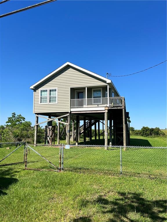 Your fisherman's paradise awaits! Stunning views of the marsh and distant views of Lake Pontchartrain! Beautiful raised home built in 2007. The lot also includes the canal side that features a boat launch. Old piers and decking are there, but need to be redone. Unbelievable fishing and crabbing only a few short steps from your front door. Home features an open layout with very spacious bedrooms, very large primary suite with soaker jet tub and separate shower. Large laundry room off the rear of the home. Relax and watch the Stunning sunsets views from your back and front porches. Open area under home allows for large family gatherings and storage for all of outdoor toys! Located only a short drive to New Orleans and right in the heart of Slidell. Priced to sell!