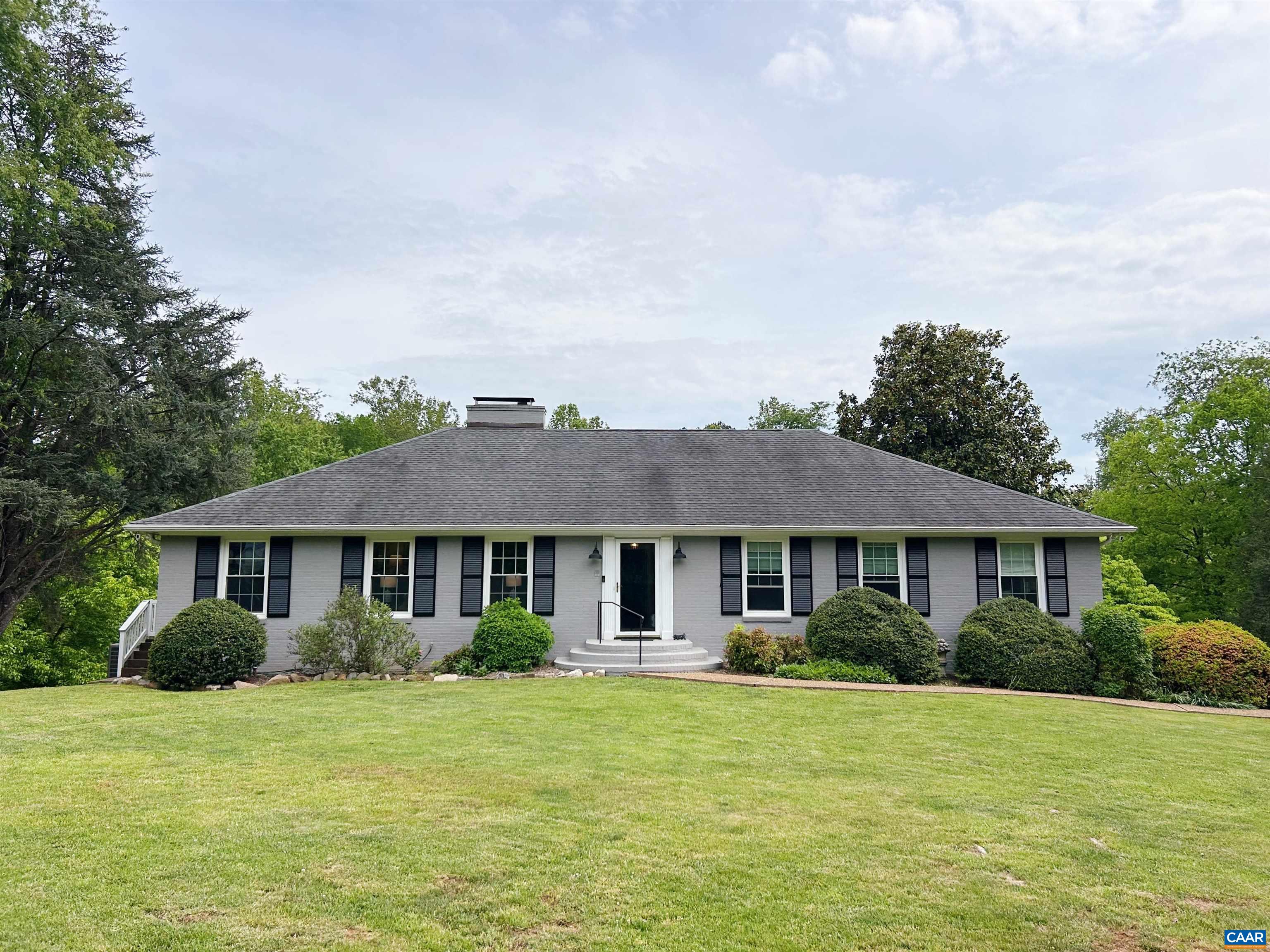 PRICED $85,000 BELOW ASSESSED VALUE! Find a place where life feels full, where neighbors become friends, and nature is at your doorstep. This classic mid-century brick home in the sought-after Key West neighborhood sits on a picturesque, pond front .79 acre lot with 3-bedrooms, 3-baths, a versatile walk-out basement, and a beautifully landscaped yard. It offers timeless charm and modern comfort. Equipped with solar panels, this home provides an eco-friendly living experience while lowering energy costs. Just steps from the Rivanna River trails, you’ll find endless opportunities for hiking, kayaking and unwinding by the water. Despite its tranquil setting, this home is just minutes from Pantops, downtown Charlottesville, I-64, and UVA, blending convenience with a peaceful retreat. Discover the lifestyle this home and community offers. In Key West, you'll find more than just a home—you'll discover a community. Updates include: Energy efficient windows, roof, solar panels, HVAC, Septic distribution box, water main to street, updated baths, basement carpet, mini-split, attic insulation, exterior paint. Major systems updated! Bring your creativity and personal style for the rest!