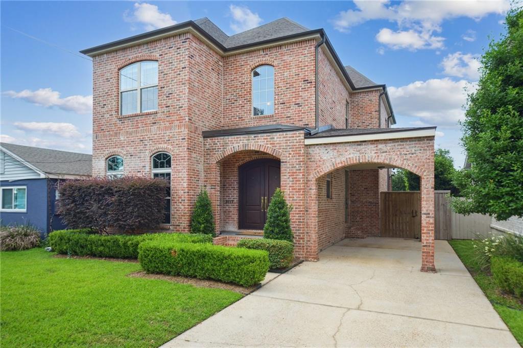Lovely 4-bedroom, 2.5-bath home in Old Metairie featuring custom details and high-quality finishes throughout. Enter through new wrought iron double doors into a grand two-story foyer, where the staircase is accented with intricate iron banisters and wainscoting. The spacious living room, which can also serve as a formal dining, is a great place to retreat. The den showcases coffered ceilings, a gas fireplace, and custom built-in shelves. The gourmet kitchen boasts an oversized marble eat-in island, a wine cooler, an ice maker, a walk-in pantry, and plenty of cabinet storage. A separate breakfast niche is perfect for everyday dining. The primary suite offers his and her walk-in closets and a newly renovated, spa-like bathroom featuring double vanities, a marble shower, a soaking tub, and a separate toilet closet. Three additional bedrooms with ample closets and a full bathroom complete the second floor. Recent upgrades include: 2022 roof, two new HVAC systems with Halo LED air purifier and second floor ductwork replacement in 2025, new wood flooring down 2022, new flooring up 2021 and hot water heater replacement 2023. The lush and private backyard has a covered patio, an outdoor projector with audio system, and plenty of green space to accommodate a pool. This property is conveniently located with easy access to Metairie Rd, I-10, and Airline.