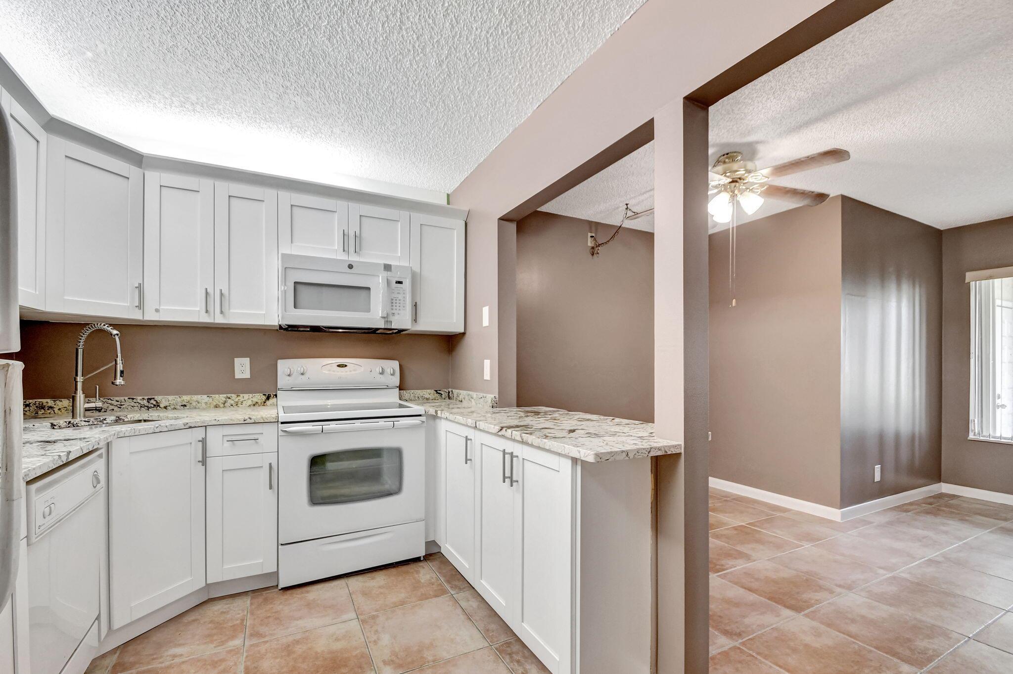 Photo 11 of home located at 3531 Tall Pine Way C-1, Greenacres FL