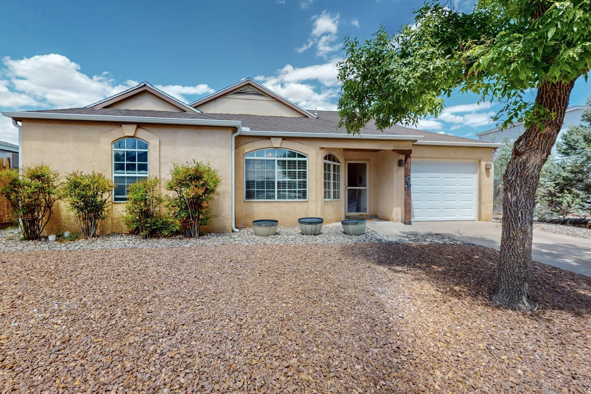 Discover your dream home in this beautifully maintained 3 bedroom 2 bath residence, nestled in a tranquil neighborhood.  Enjoy the spacious open floor plan perfect for entertaining or family gatherings.  This home features elegant laminate flooring throughout, providing both style and easy maintenance.  Step outside to a large yard, ideal for outdoor activities, gardening or simply relaxing.   Don't miss the opportunity to make this charming house your new home.