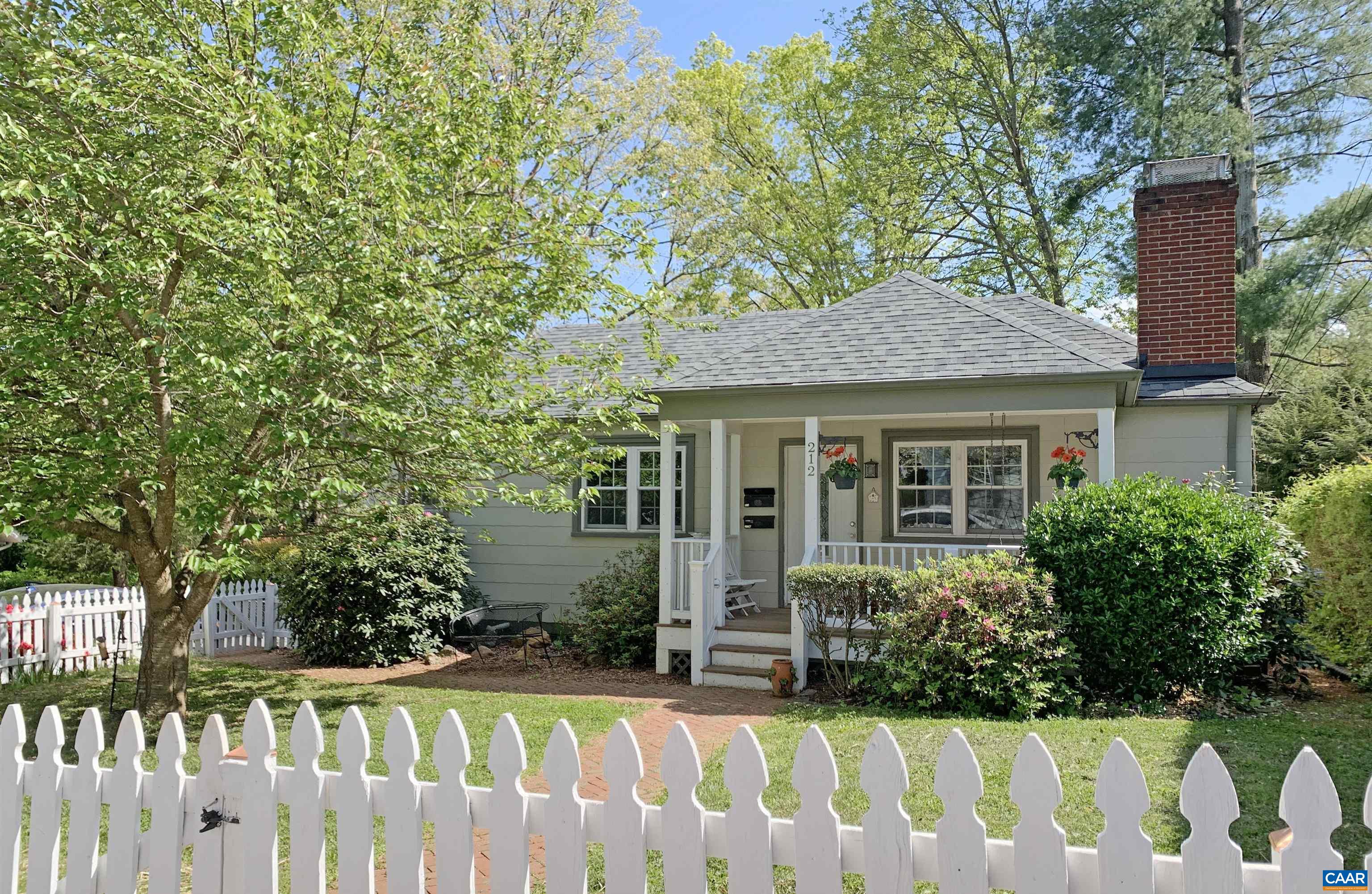 This delightful home blends classic mid-century character with modern updates in a prime Charlottesville location. Situated on a beautifully landscaped corner lot, this property offers the best of both worlds: peace and privacy on a quiet street, just minutes from UVA, downtown, and all the city has to offer. Inside, you'll find 2 spacious bedrooms and a beautifully remodeled full bath on the main level. Thoughtfully designed for both comfort and functionality, the home features a separate living room and dining room, an uncommon find in homes this size. Original details and natural light throughout add warmth and charm. Downstairs, the walk-out basement has been transformed into a fully functional one-bedroom apartment and with its own entrance, ideal for rental income, guests, or extended family. Mature trees and landscaping frame the home, creating a lush and private setting for relaxing or entertaining. Don’t miss this unique opportunity to own a character-rich home with income potential in one of Charlottesville’s most convenient and desirable neighborhoods!