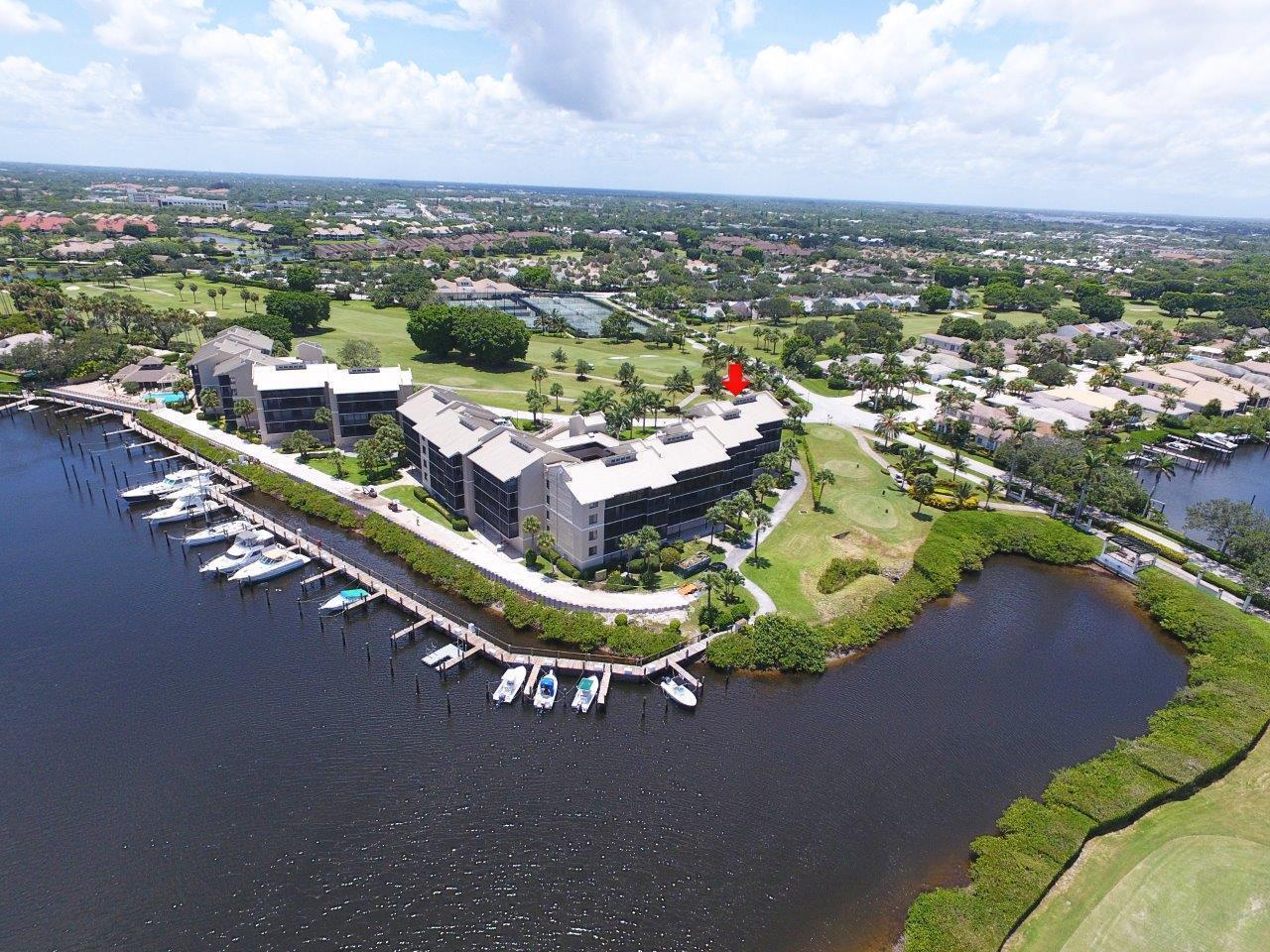 Waterfront 2BD/2BA condo in prestigious Jonathan's Landing with rare 40-ft screened balcony overlooking lagoon and golf course. Open layout, split bedrooms, and chef's kitchen with stainless appliances and breakfast bar. Anchorage offers covered parking, golf cart storage, guest parking, and a marina with ocean access-dock your boat below your condo! 2025 budget includes fully funded reserves and SIRS. Fees cover Hotwire internet, cable, and ADT monitoring. Club membership optional, condo is walking distance to Tennis, Pickleball, Gym and Golf Clubhouse. Optional membership includes 3 golf courses. Reside in an amazing location in Jupiter close to pet friendly Jupiter Beaches, no fixed bridges allowing boat access to Jupiter Inlet in 15 minutes from Anchorage's private, protected marina.
